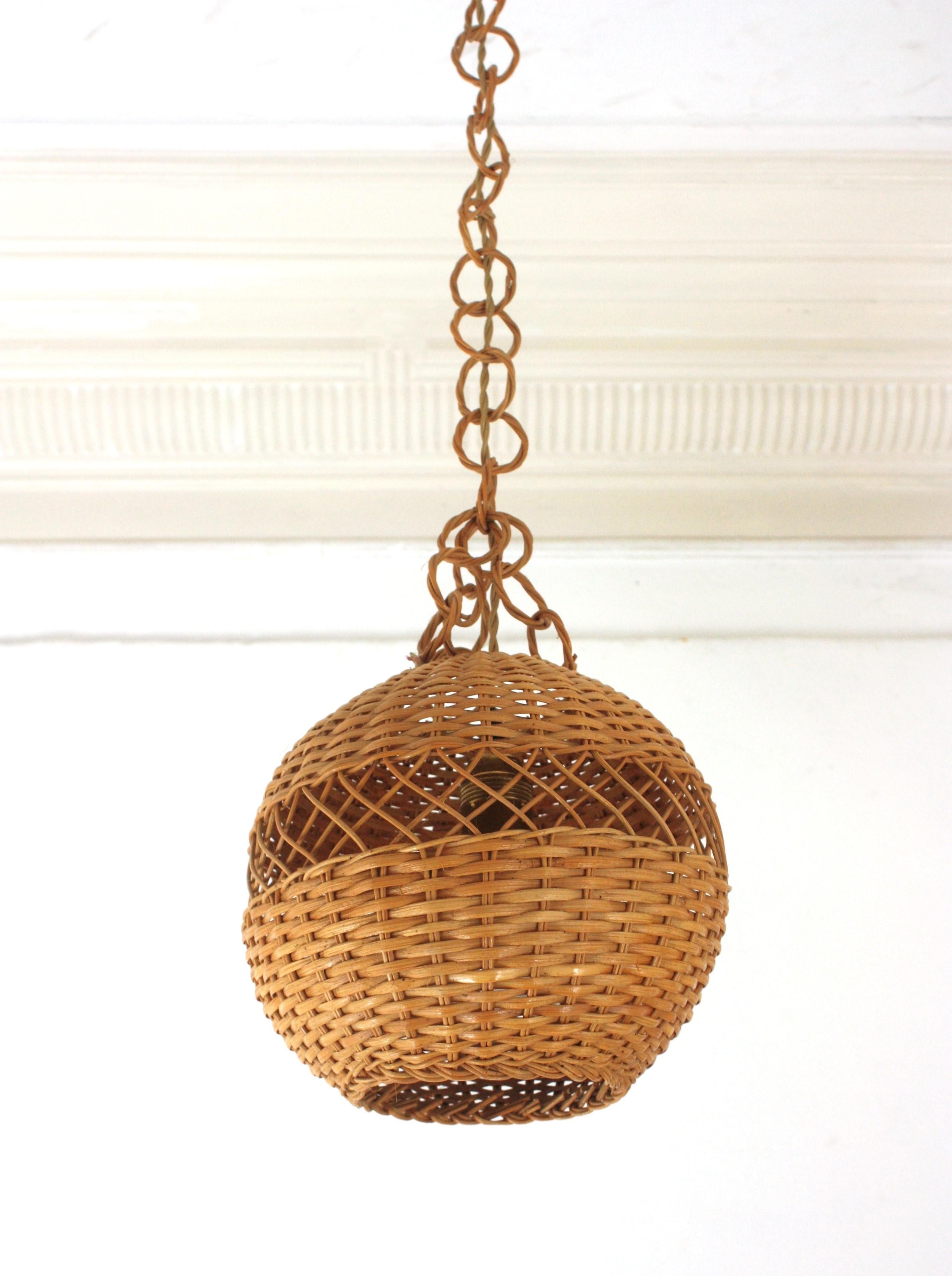20th Century Pair of Handwoven Wicker Globe Pendant Lights or Lanterns For Sale