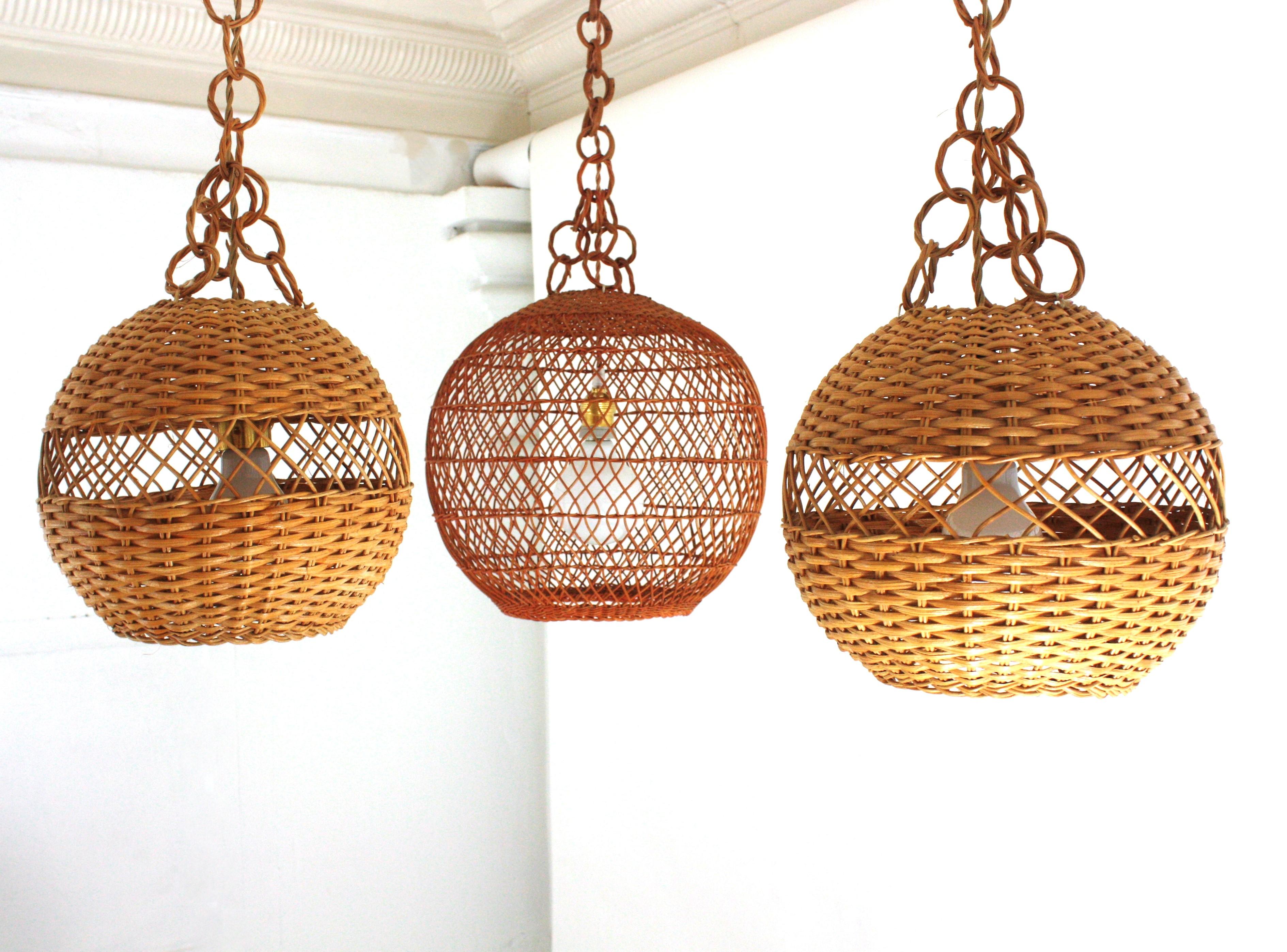 Pair of Handwoven Wicker Globe Pendant Lights or Lanterns For Sale 2