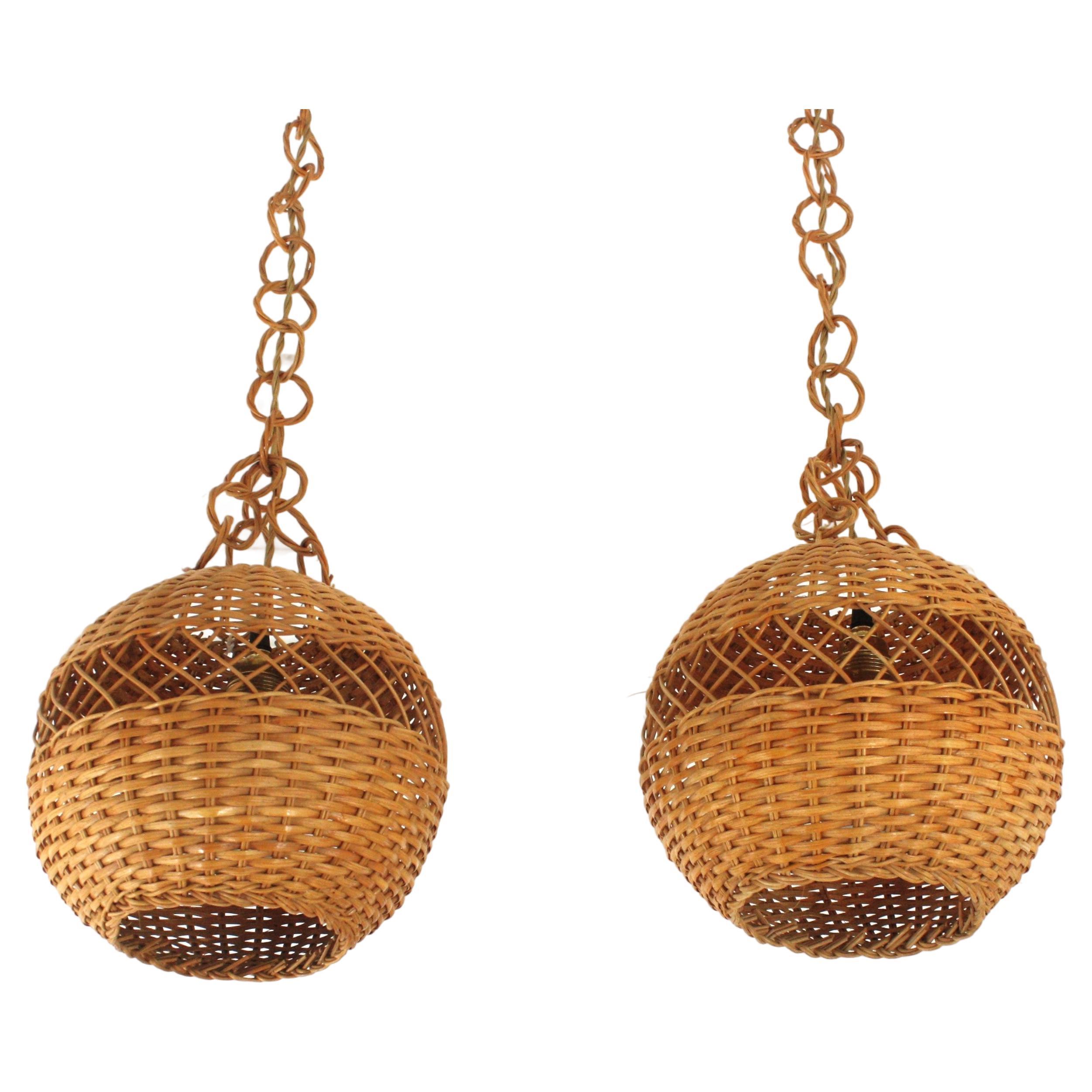 Pair of Handwoven Wicker Globe Pendant Lights or Lanterns For Sale