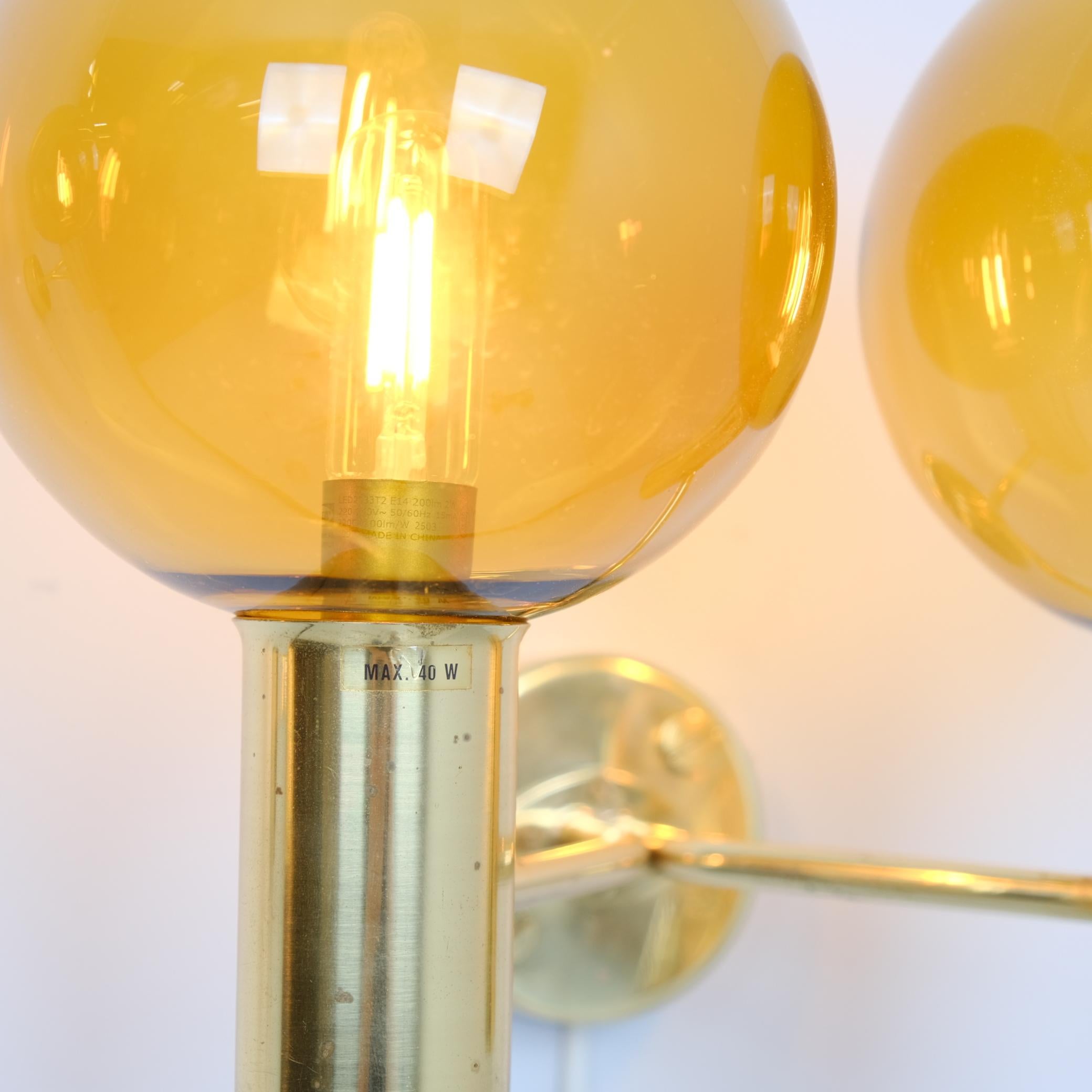 Late 20th Century Pair of Hans-Agne Jakobsson Brass Wall Lamp Model. V 149/2, Amber Glass, 1950s For Sale
