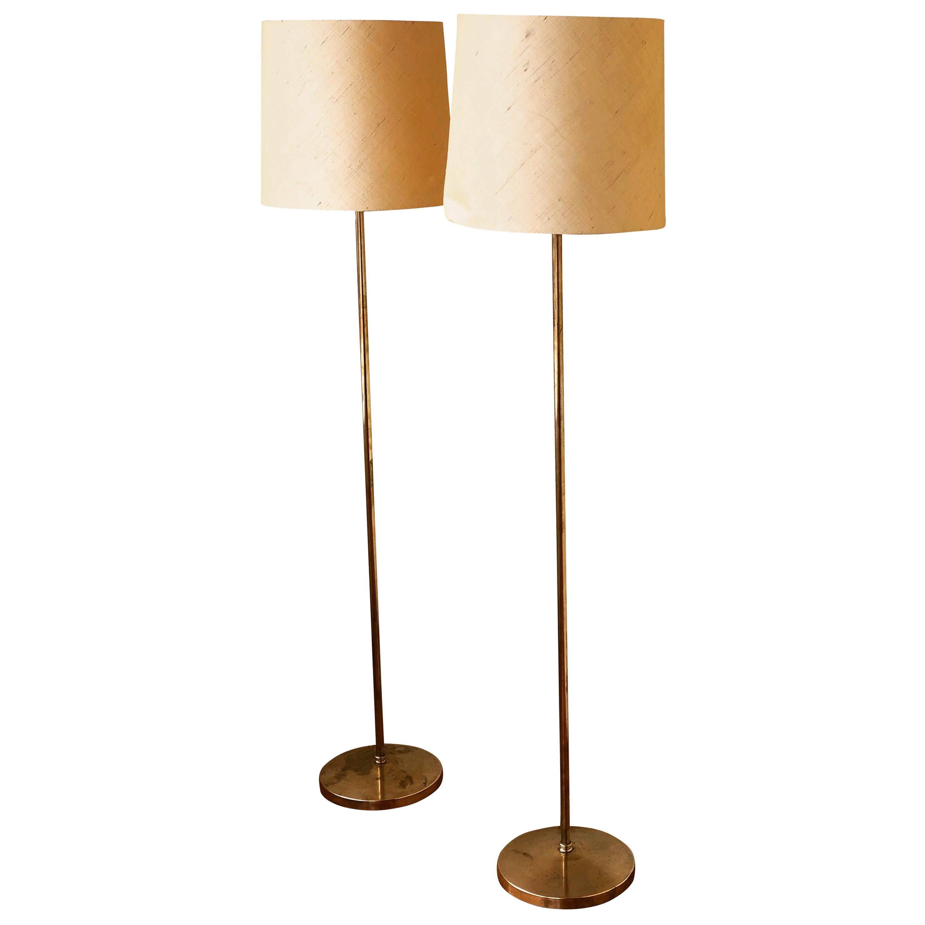 Pair of Hans-Agne Jakobsson Polished Brass Floor Lamps For Sale