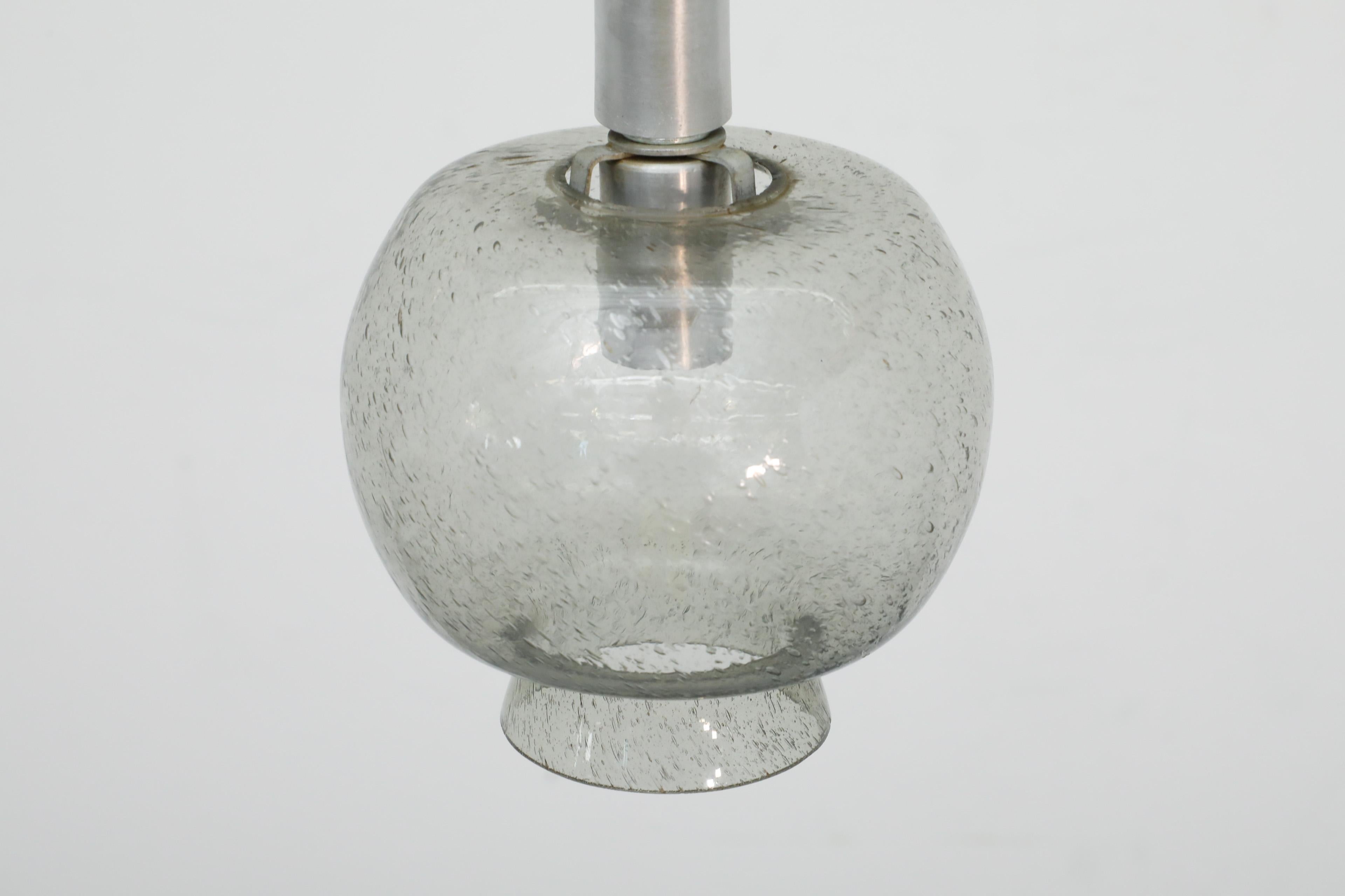 20th Century Pair of Hans Agne Jakobsson Style Smoked Blown Glass Ceiling Pendants For Sale