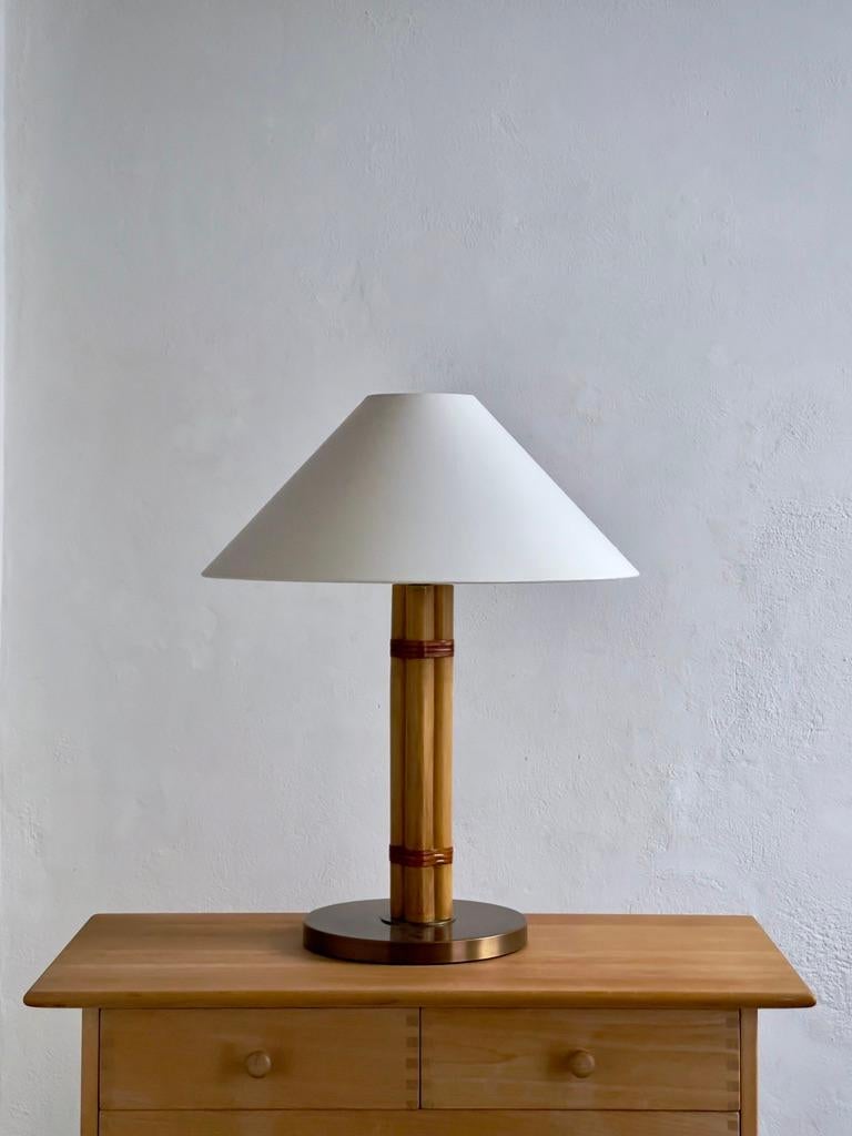 Brass Pair of Hans Agne Jakobsson table lamps in brass, leather and bamboo.Sweden 1970 For Sale
