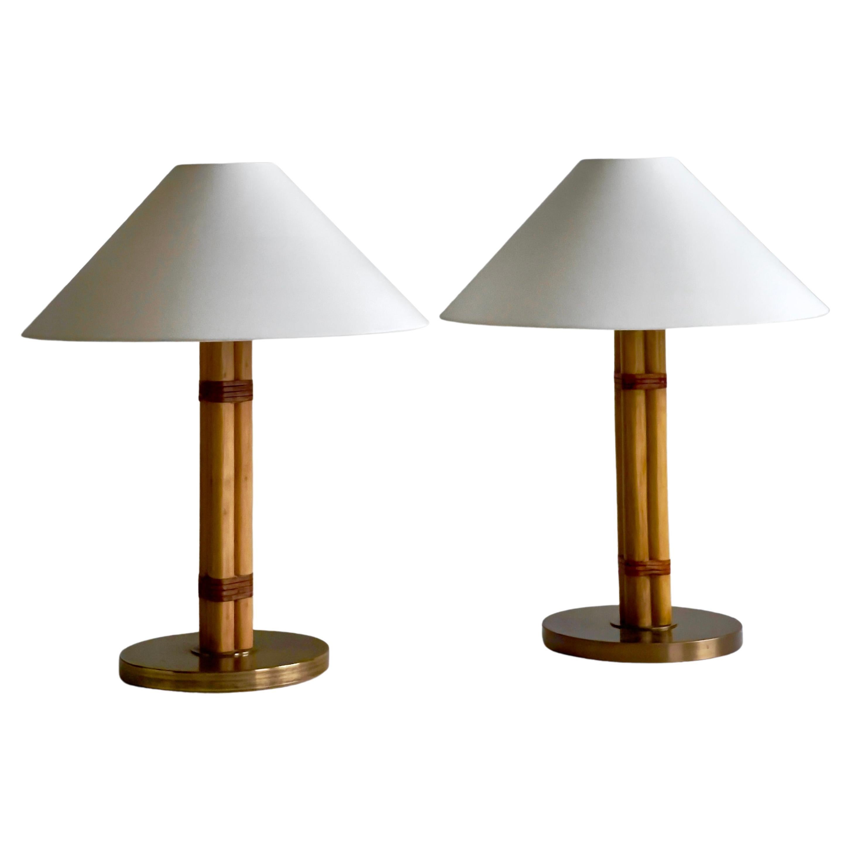 Pair of Hans Agne Jakobsson table lamps in brass, leather and bamboo.Sweden 1970