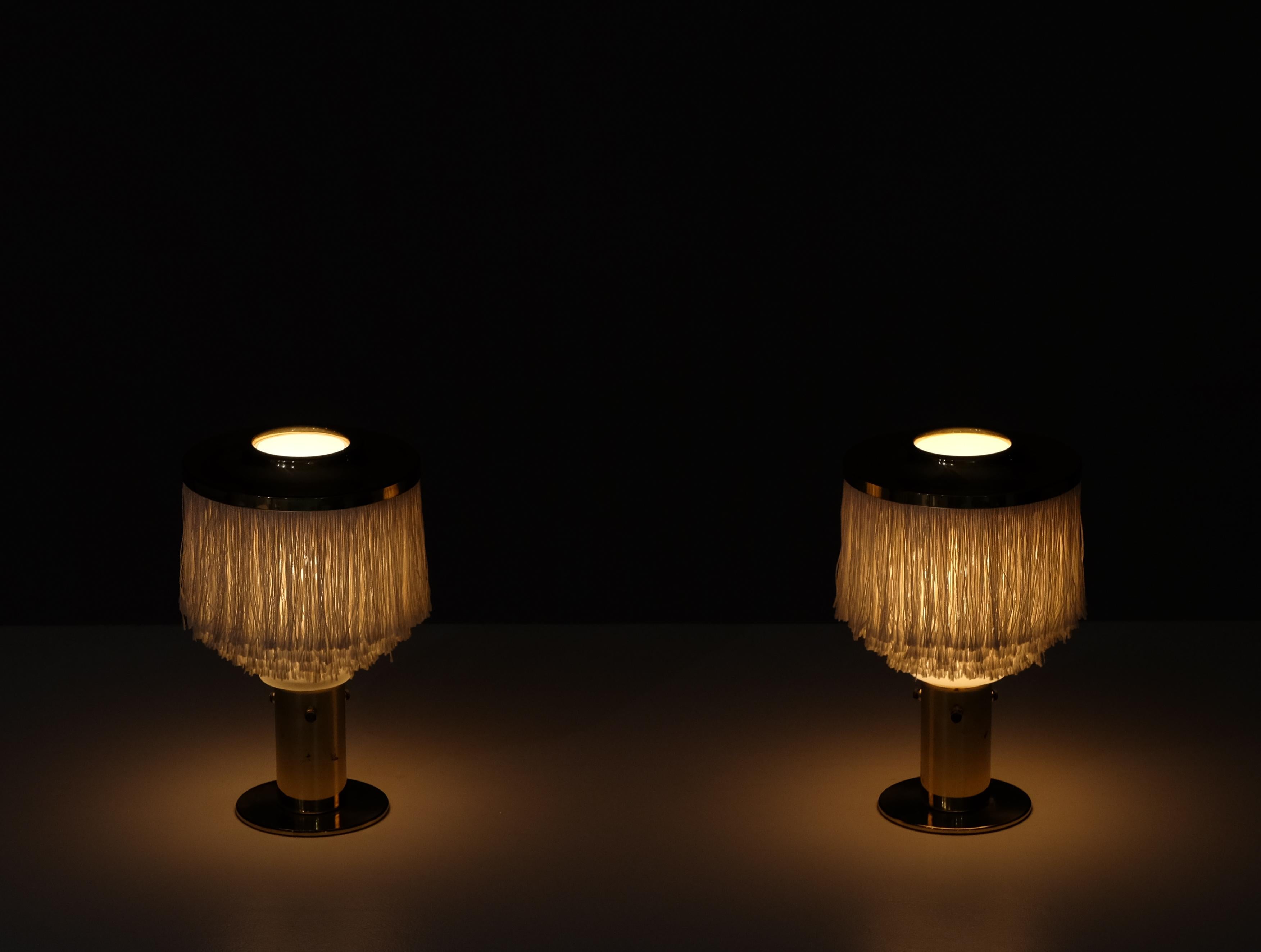 Ivory white fringes, brass and opaline glass shades. Produced by Hans-Agne Jakobsson, Markaryd, 1960s.