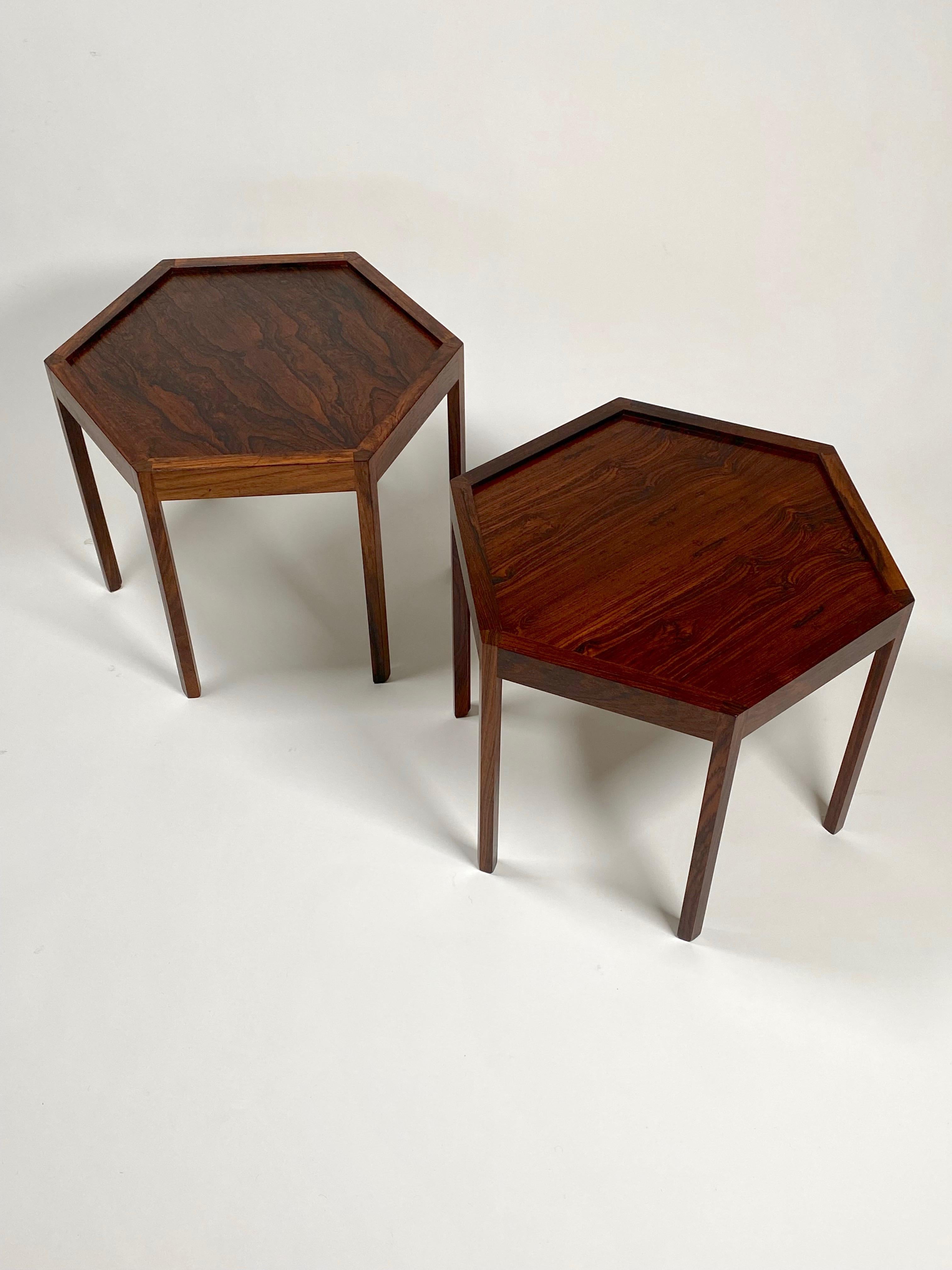 Pair of hexagonal rosewood stackable side tables by Danish designer Hans C Andersen, uncommon to find this design in a all rosewood construction. Created with great attention to detail in the manufacturing of these tables, i.e., the joinery and the