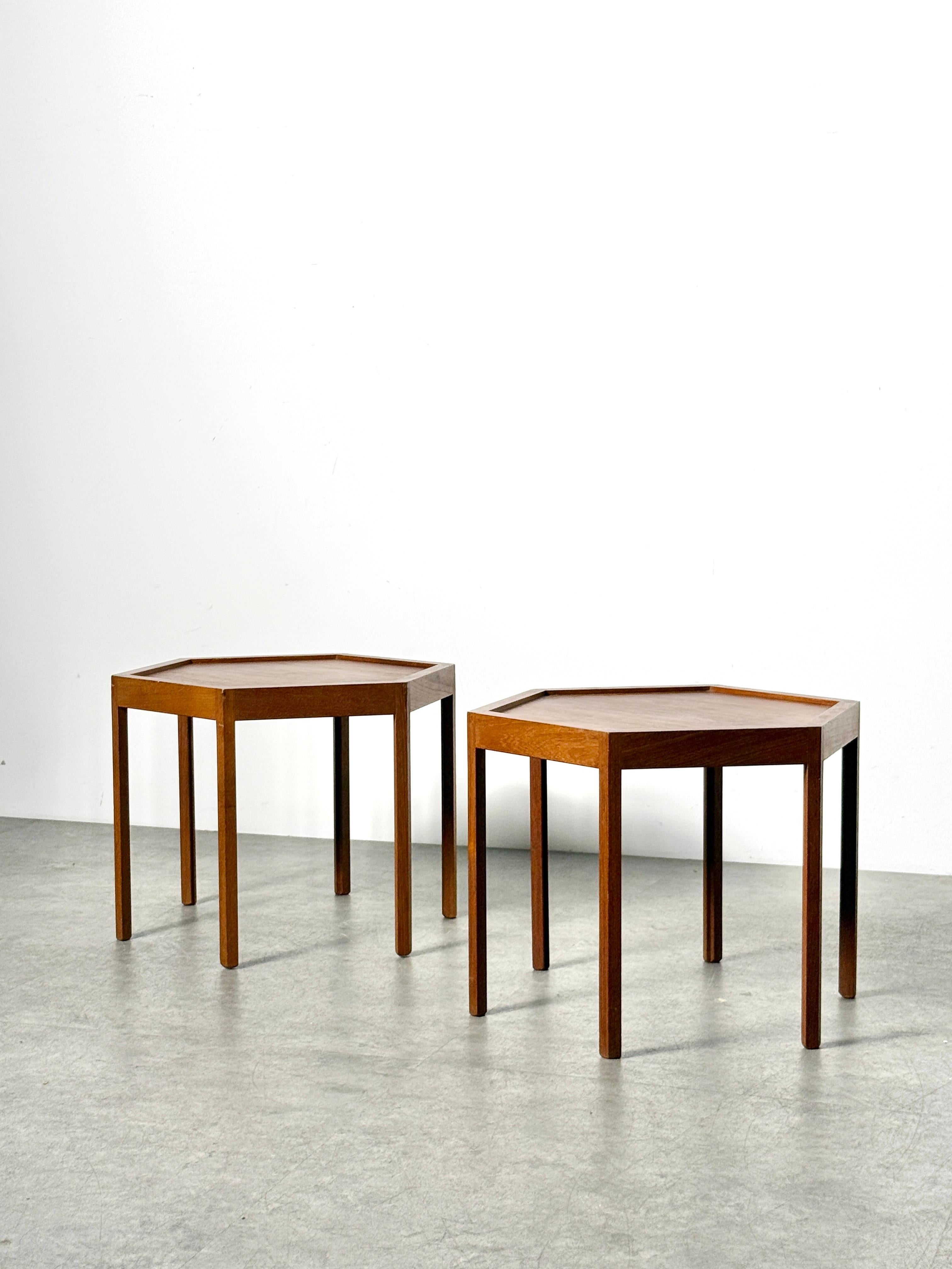 Side tables designed by Hans Christian Andersen for Artex
Denmark circa 1960's
A pair

Hexagonal design in teak with six straight legs
Exceptional craftsmanship with precise mitered joints and seamless integration of the legs at each corner

Both