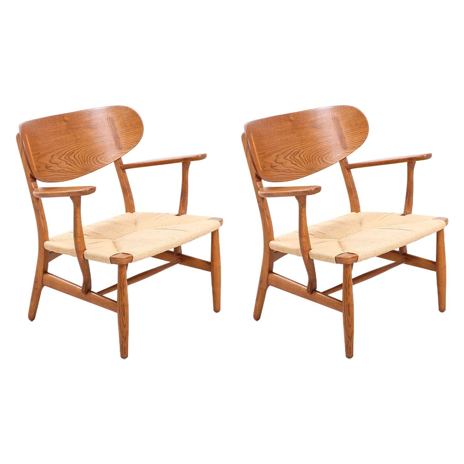 Pair of Hans J. Wegner CH-22 Lounge Chairs for Carl Hansen & Søn