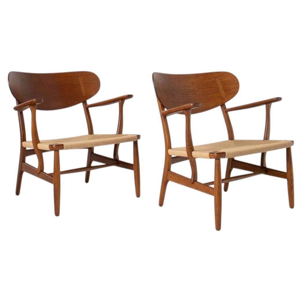 Pair of Hans J. Wegner CH22 Lounge Chairs, Oak, Mid-Century Modern For Sale