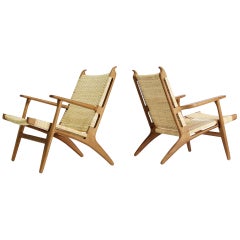 Pair of Hans J. Wegner Lounge Chairs Model CH-27 in Oak & Cane Carl Hansen & Son