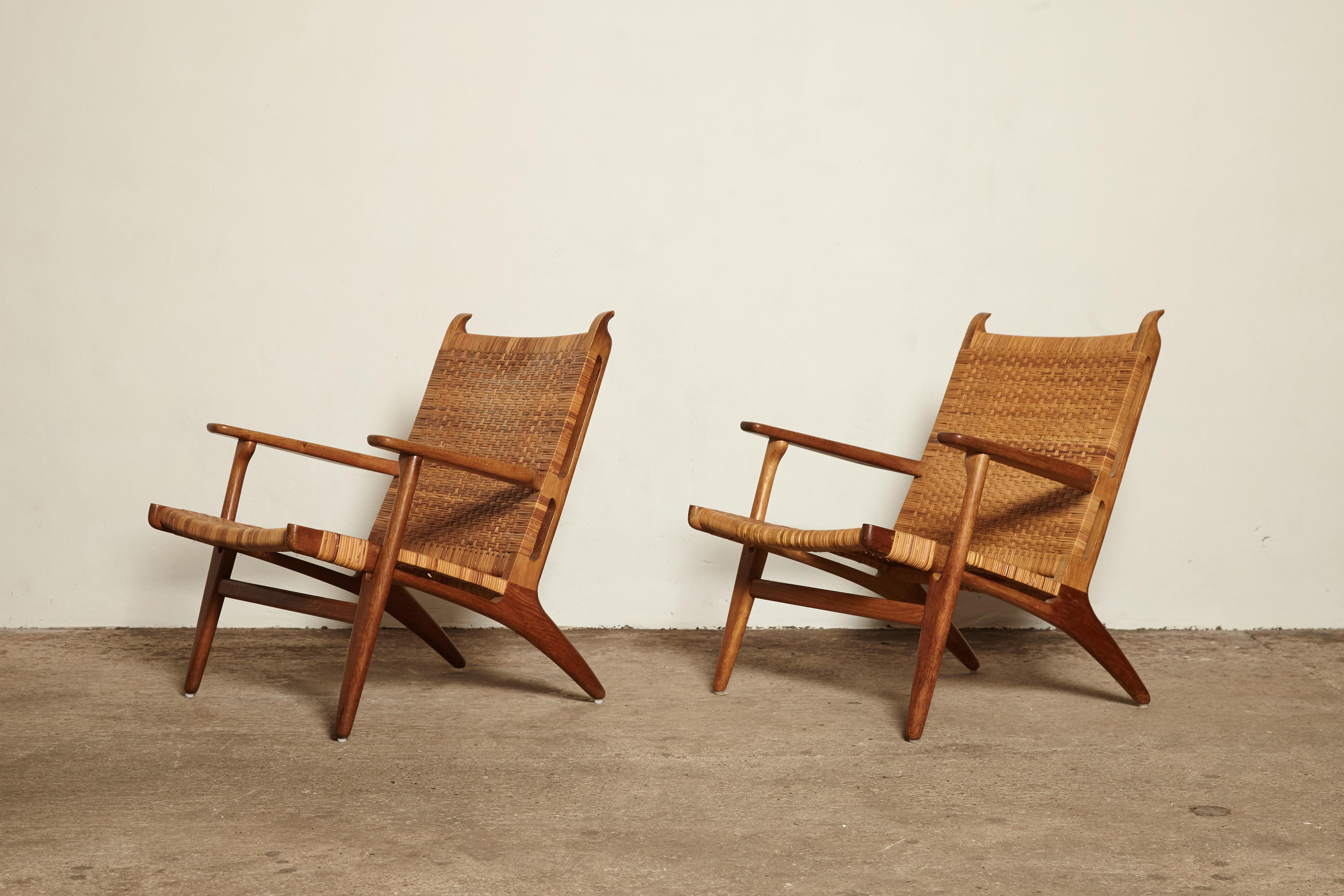 A stunning pair of CH27 chairs designed by Hans Wegner for Carl Hansen, Denmark, 1950s.