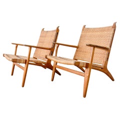 Pair of Hans Wegner CH-27 Oak and Cane Chairs