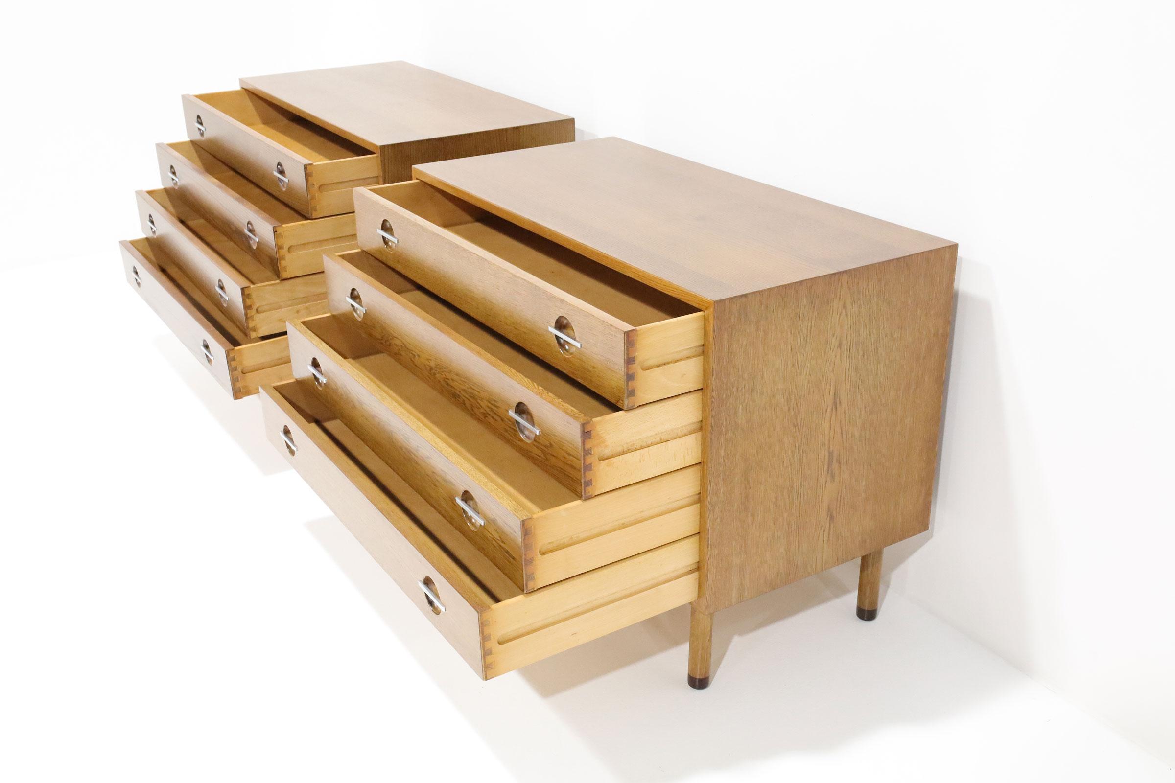A beautiful pair of nightstands or chests of drawers designed by Hans Wegner for Ry Mobler. These were imported to the USA by George Tanier who only imported the finest furniture pieces. 