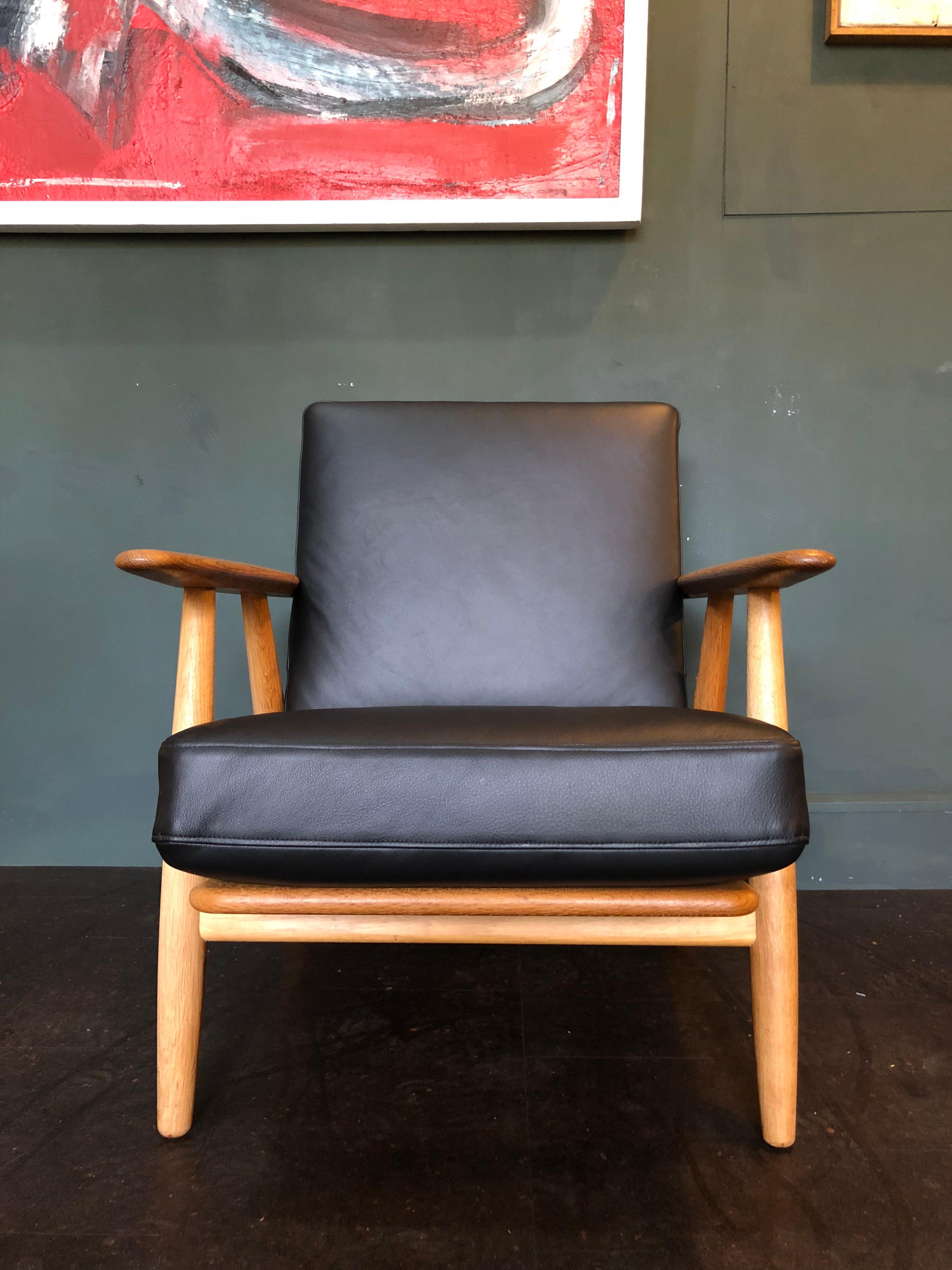 Pair of Hans Wegner Cigar Chairs and Ottomans. Original GE240, Reupholstered 7