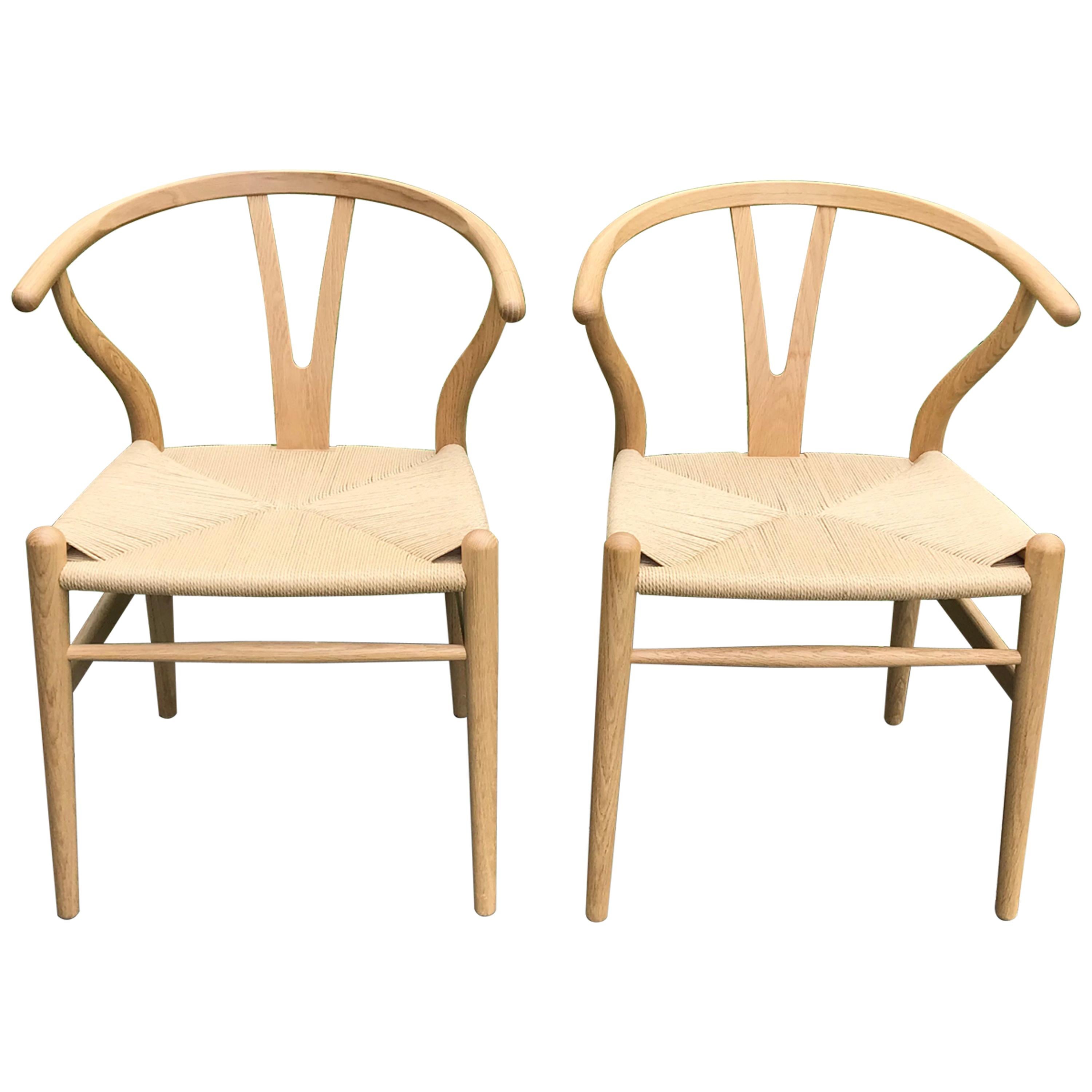 Pair of Hans Wegner for Carl Hansen Wishbone Chairs in Oak with Handwoven Seat