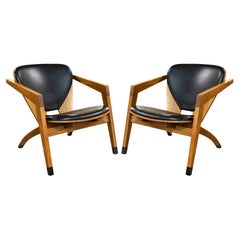 Paire de fauteuils de salon de style papillon GE-460 en bois et cuir Hans Wegner