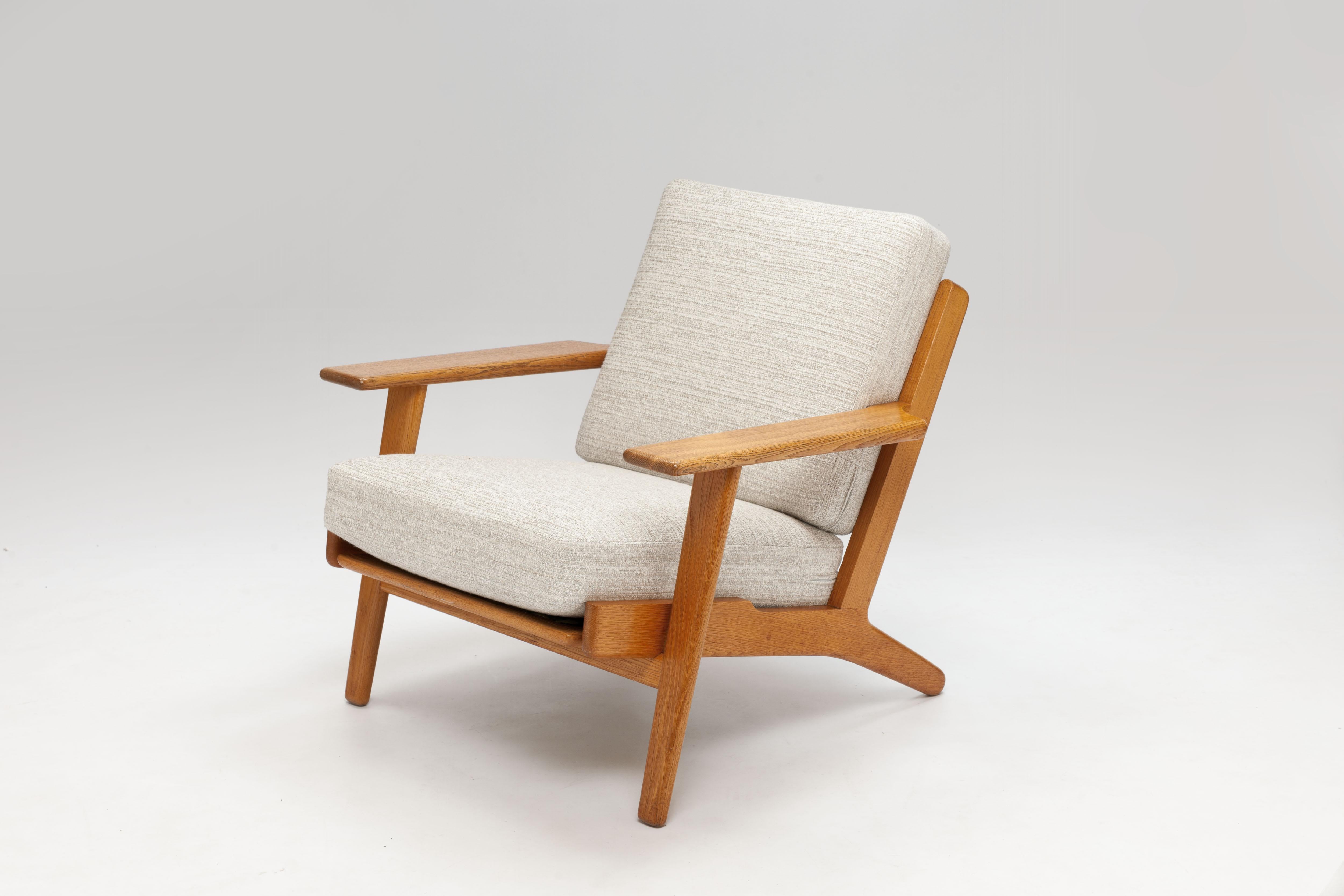 Danish Pair of Hans Wegner Lounge Chairs GE290 by GETAMA