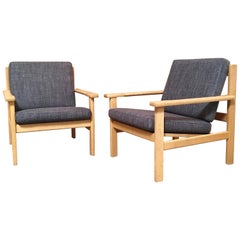 Pair of Hans Wegner Lounge Chairs in Oak