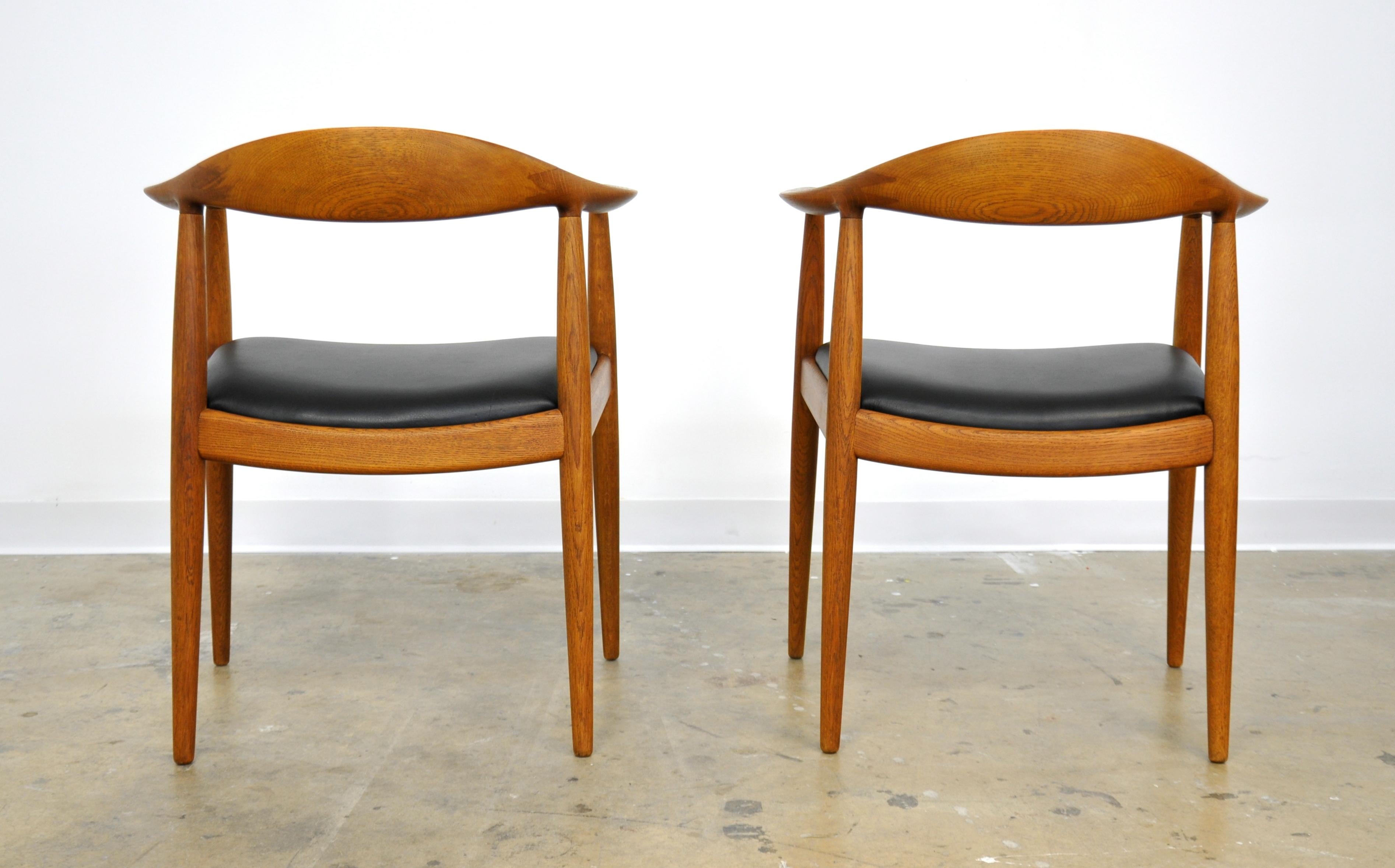 Danish Pair of Hans Wegner for Johannes Hansen Oak and Black Leather Round Chairs