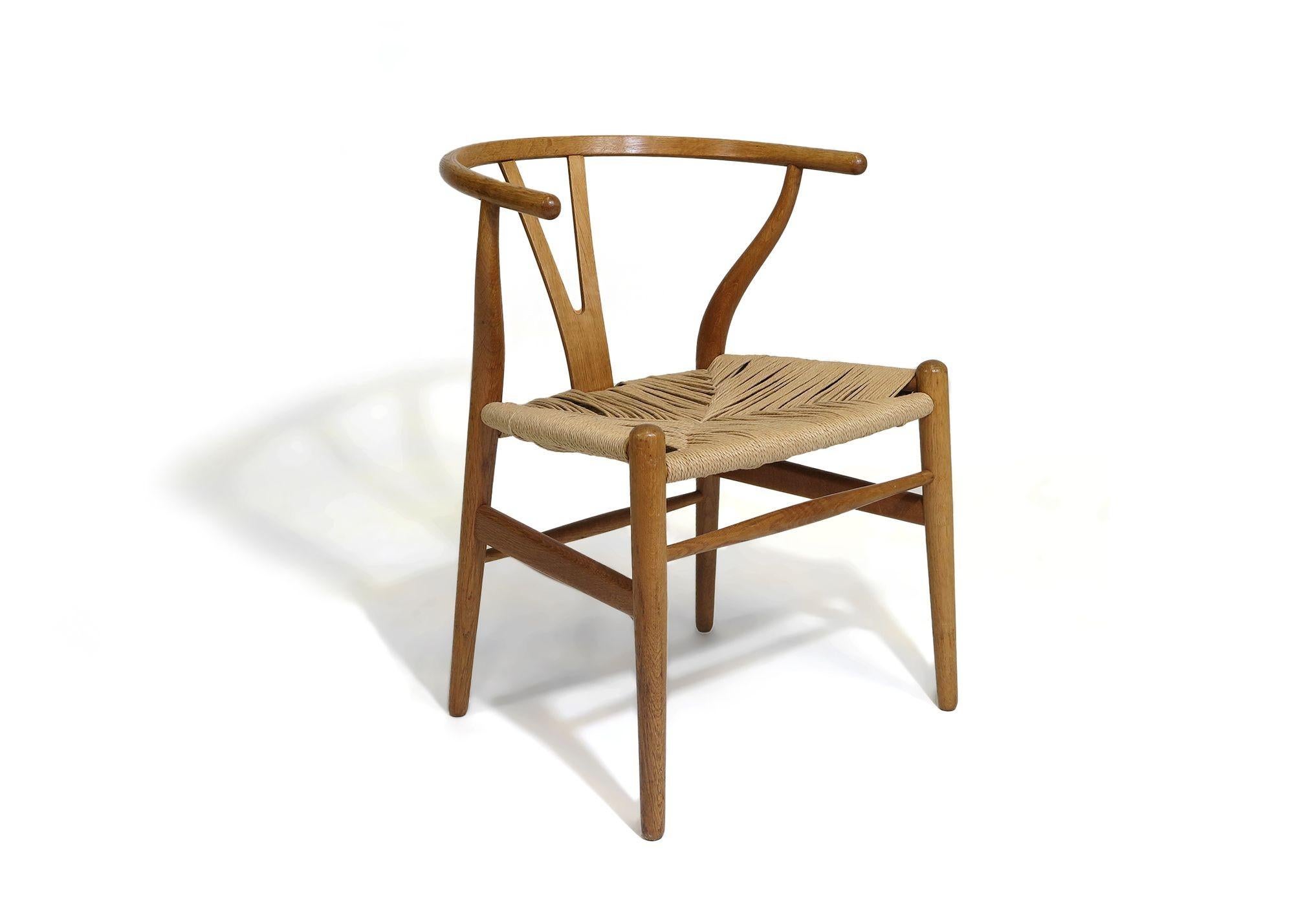 Oiled Pair of Hans Wegner Wishbone Danish Dining Chairs CH 24 For Sale