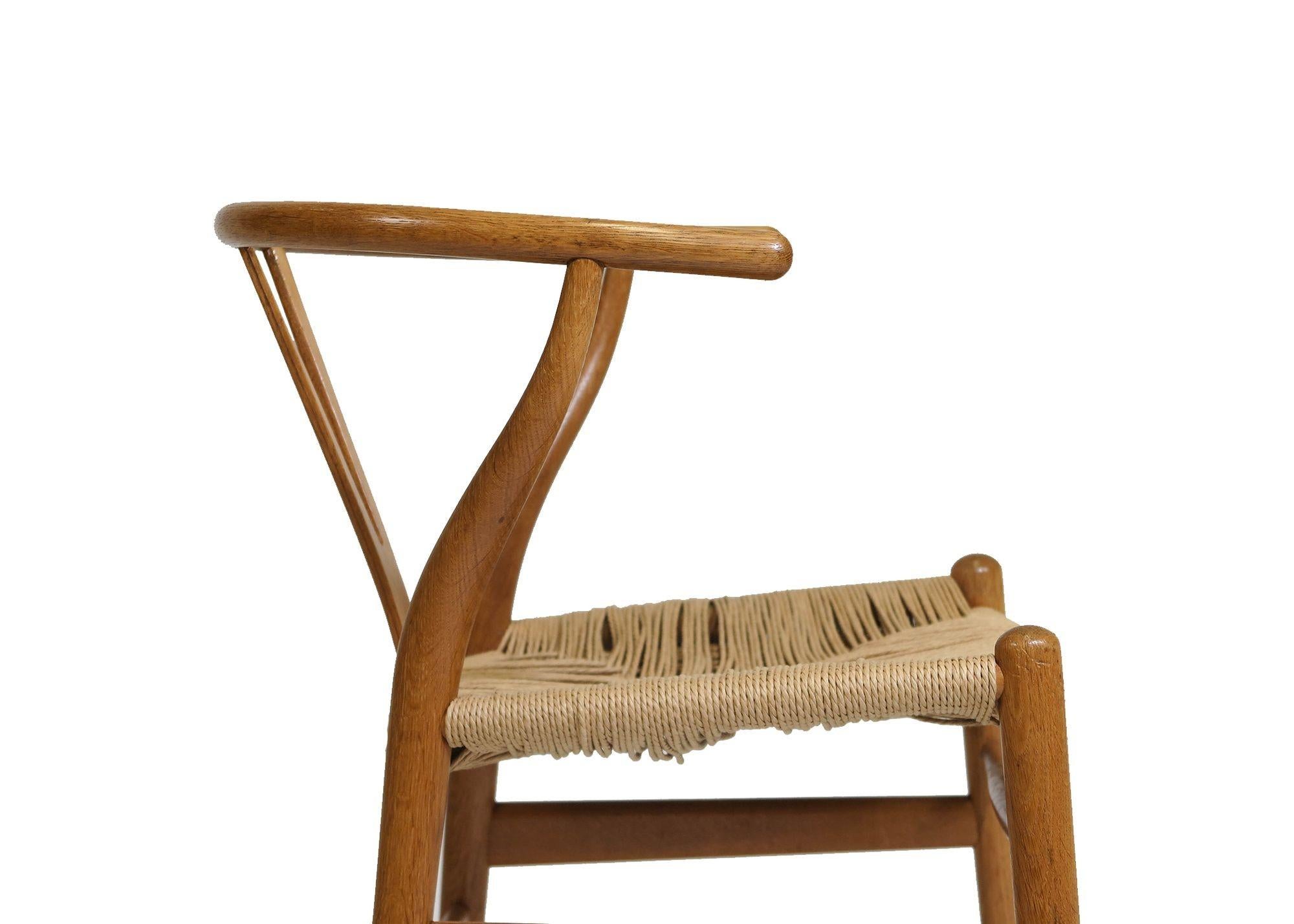 20th Century Pair of Hans Wegner Wishbone Danish Dining Chairs CH 24 For Sale