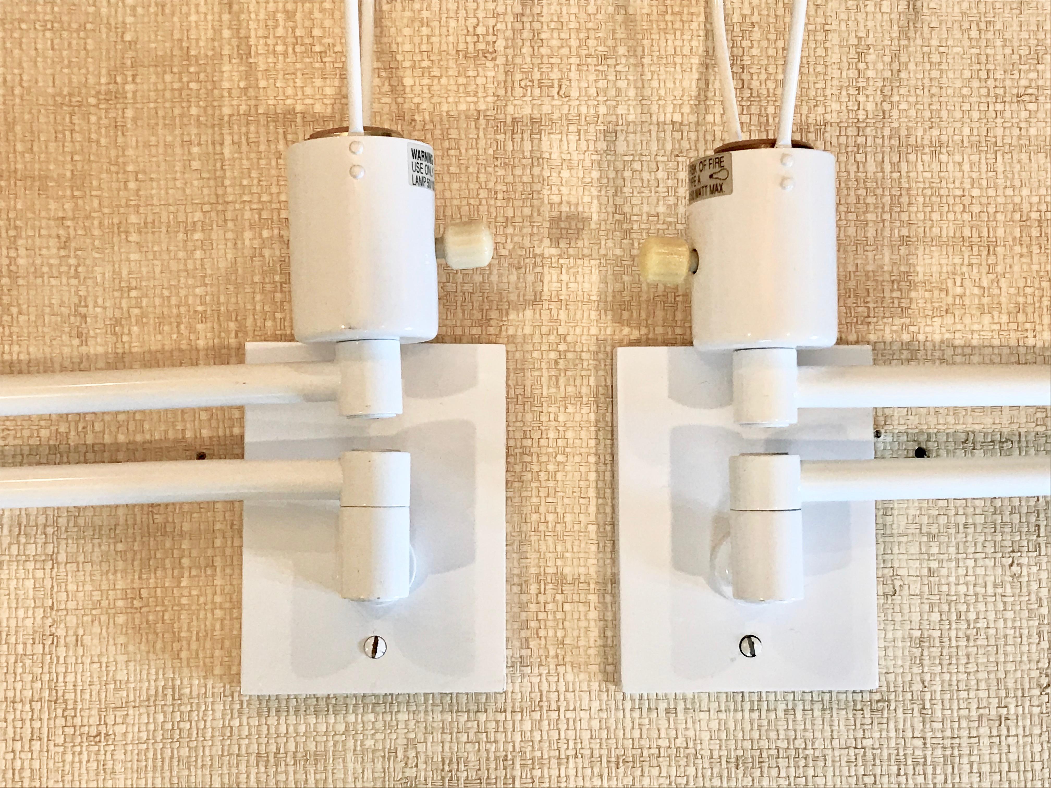 Pair of Hansen Double Swing Arm Wall Sconce in White Lacquer In Good Condition In Dallas, TX
