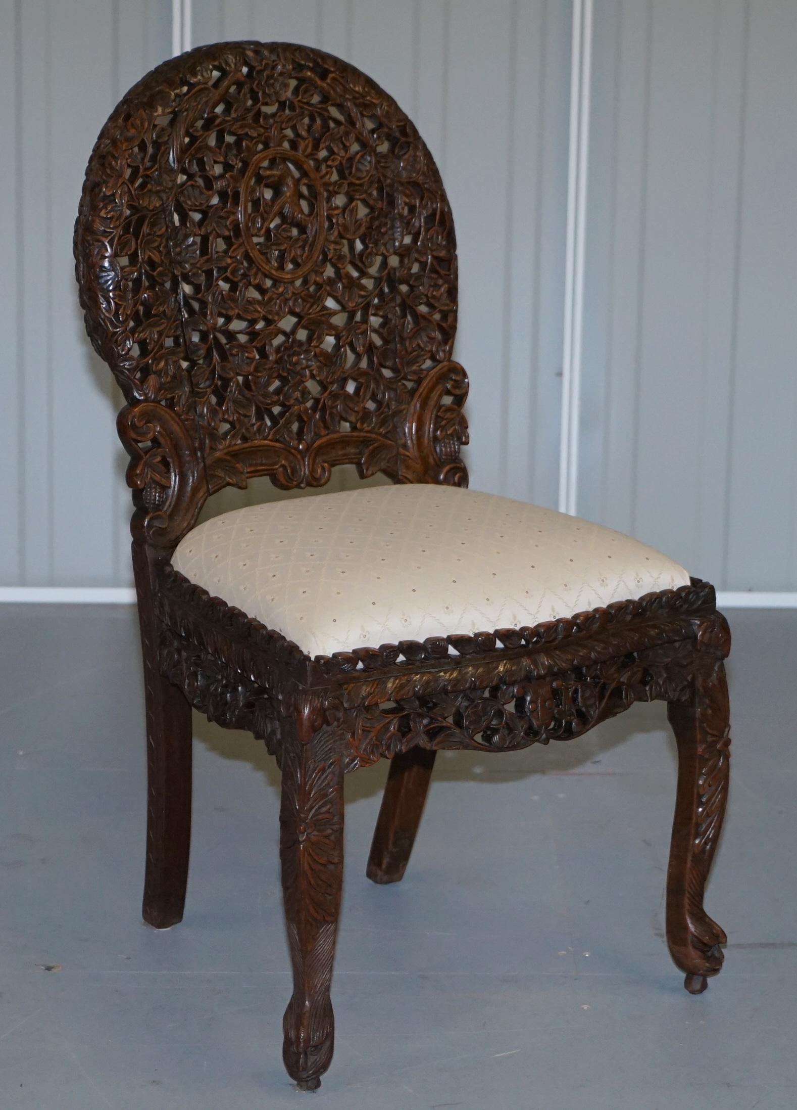 We are delighted to offer for sale this is for an original pair of solid Hardwood Anglo-Indian Burmese hand carved chairs

A very rare find, you see singles pop up every now and again but rarely an original a pair. The condition is good, they have