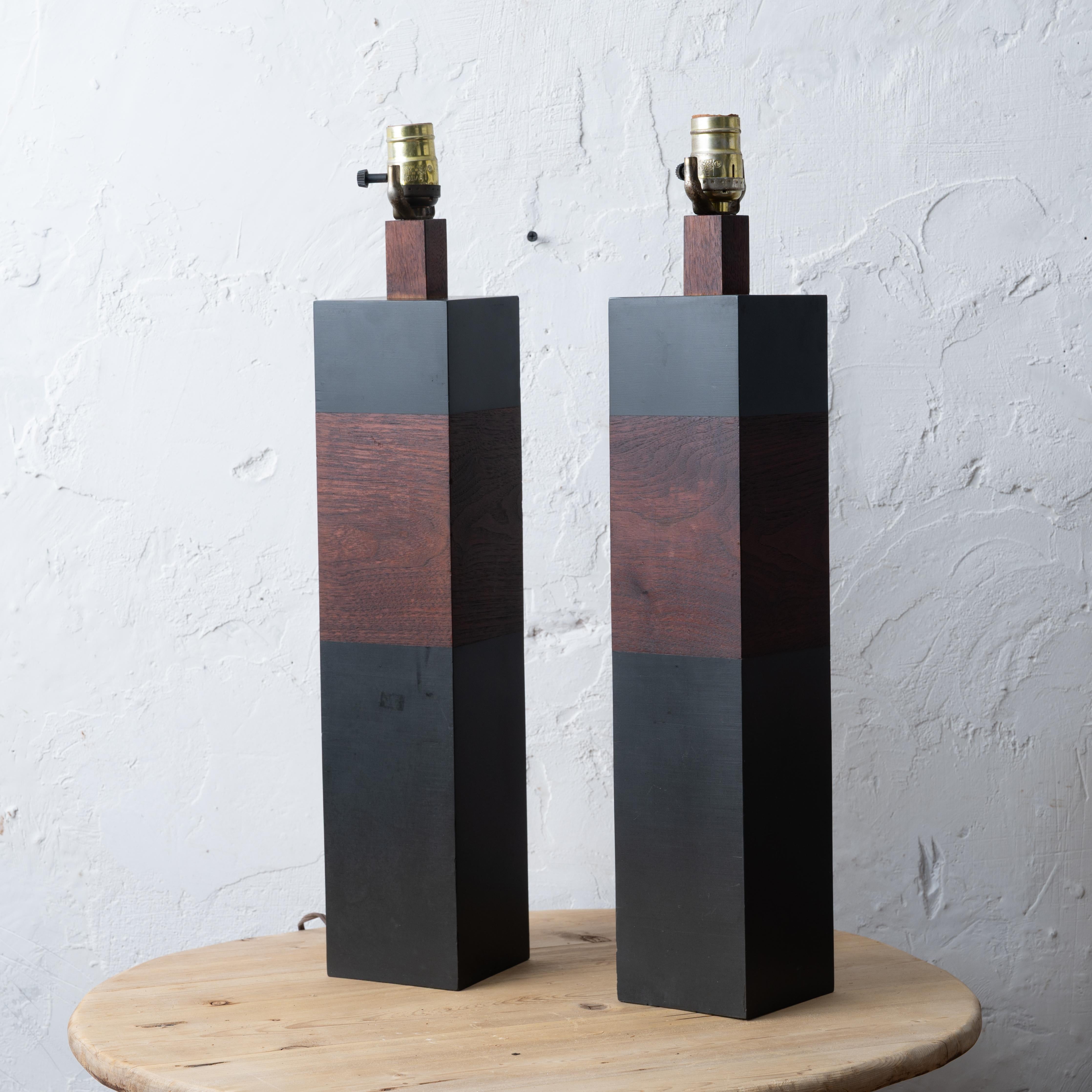 A pair of Harpswell House slate and teak lamps, circa 1960.



4 inches square by 18 inches tall; 23 inches to top of socket