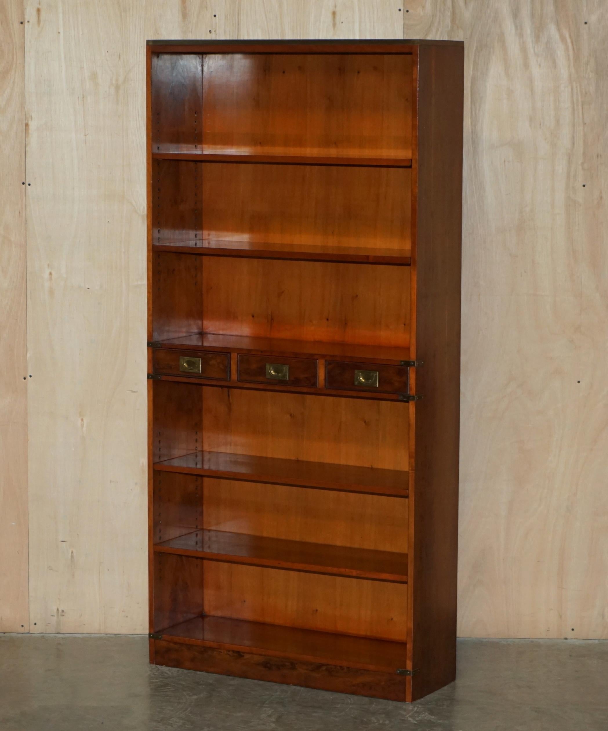 Royal House Antiques

Royal House Antiques is delighted to offer for this lovely pair of vintage Harrods Kennedy Burr Yew wood & Brass Military Campaign three drawer open library bookcases

Please note the delivery fee listed is just a guide, it