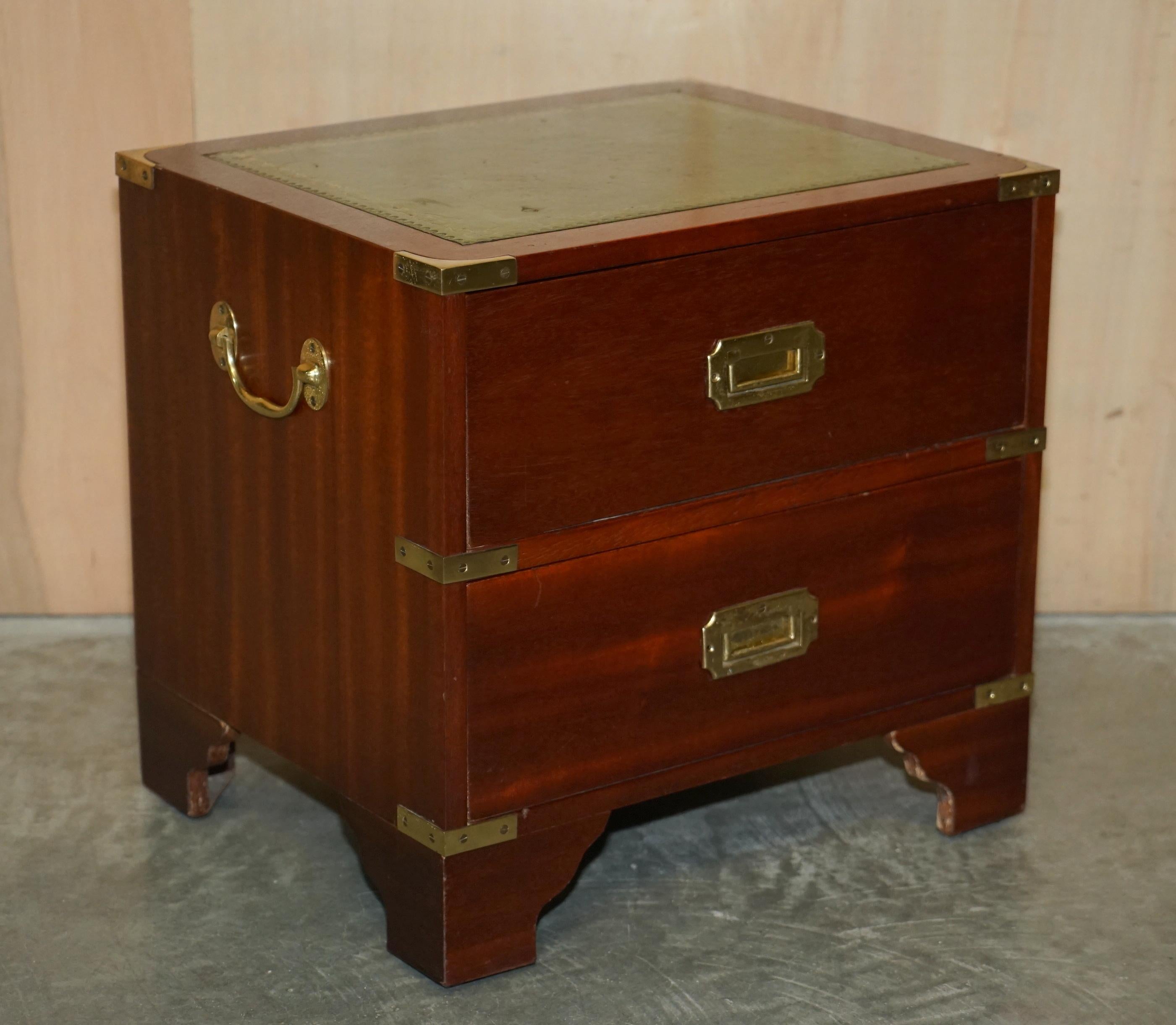 We are delighted to offer for sale this sublime pair of vintage Harrods Kennedy Military Campaign side tables with drawers and green leather tops 

A truly stunning and well made pair by Kennedy Furniture and retailed through Harrods London. They