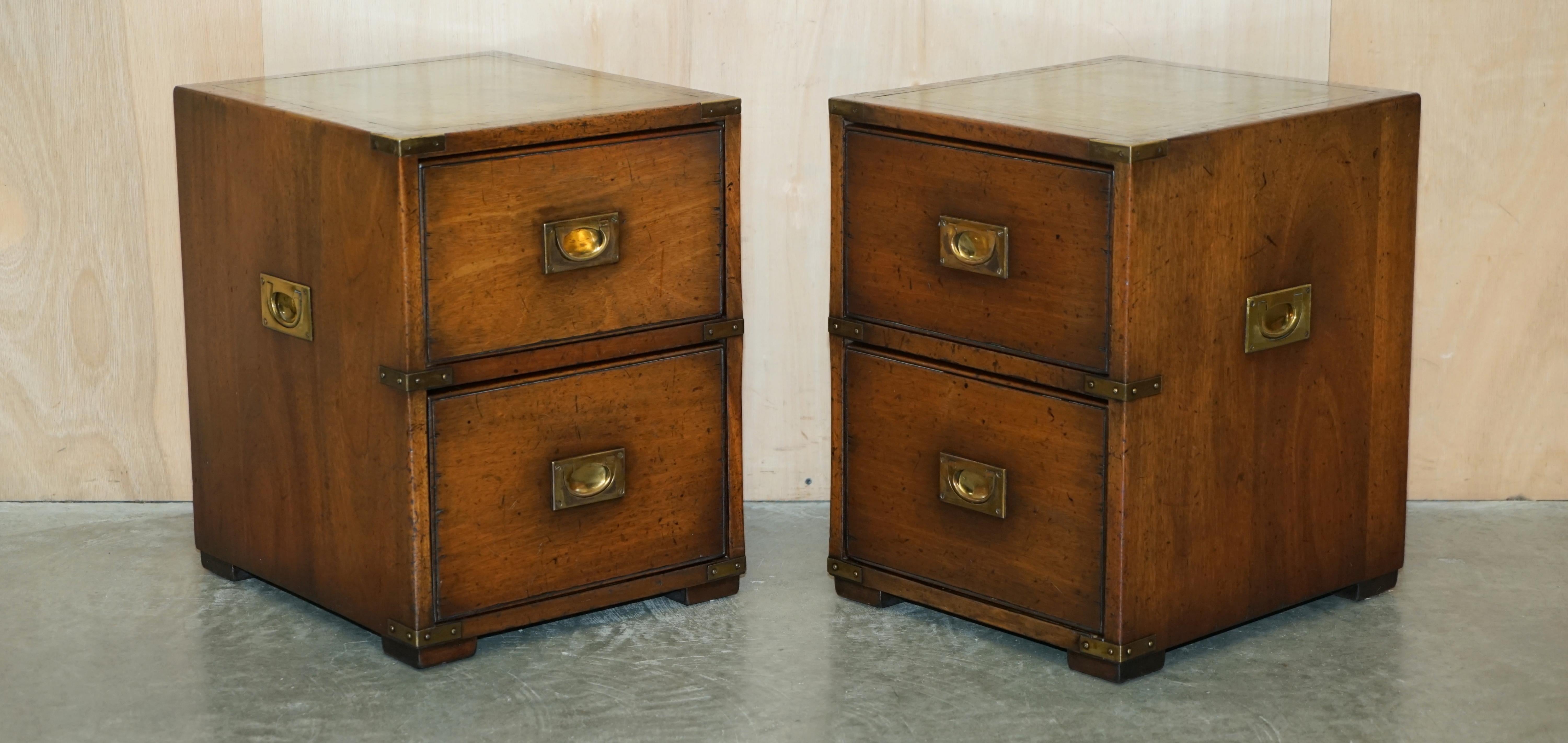 Royal House Antiques

Royal House Antiques is delighted to offer for sale this stunning pair of hand made in England, retailed through Harrods London, Military Campaign bedside table sized chests of drawers with green leather tops 

Please note the