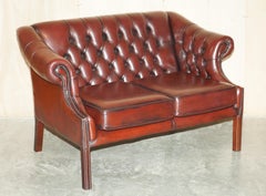 Pair of Harrods London Restored Bordeaux Brown Leather Chesterfield Tufted Sofas