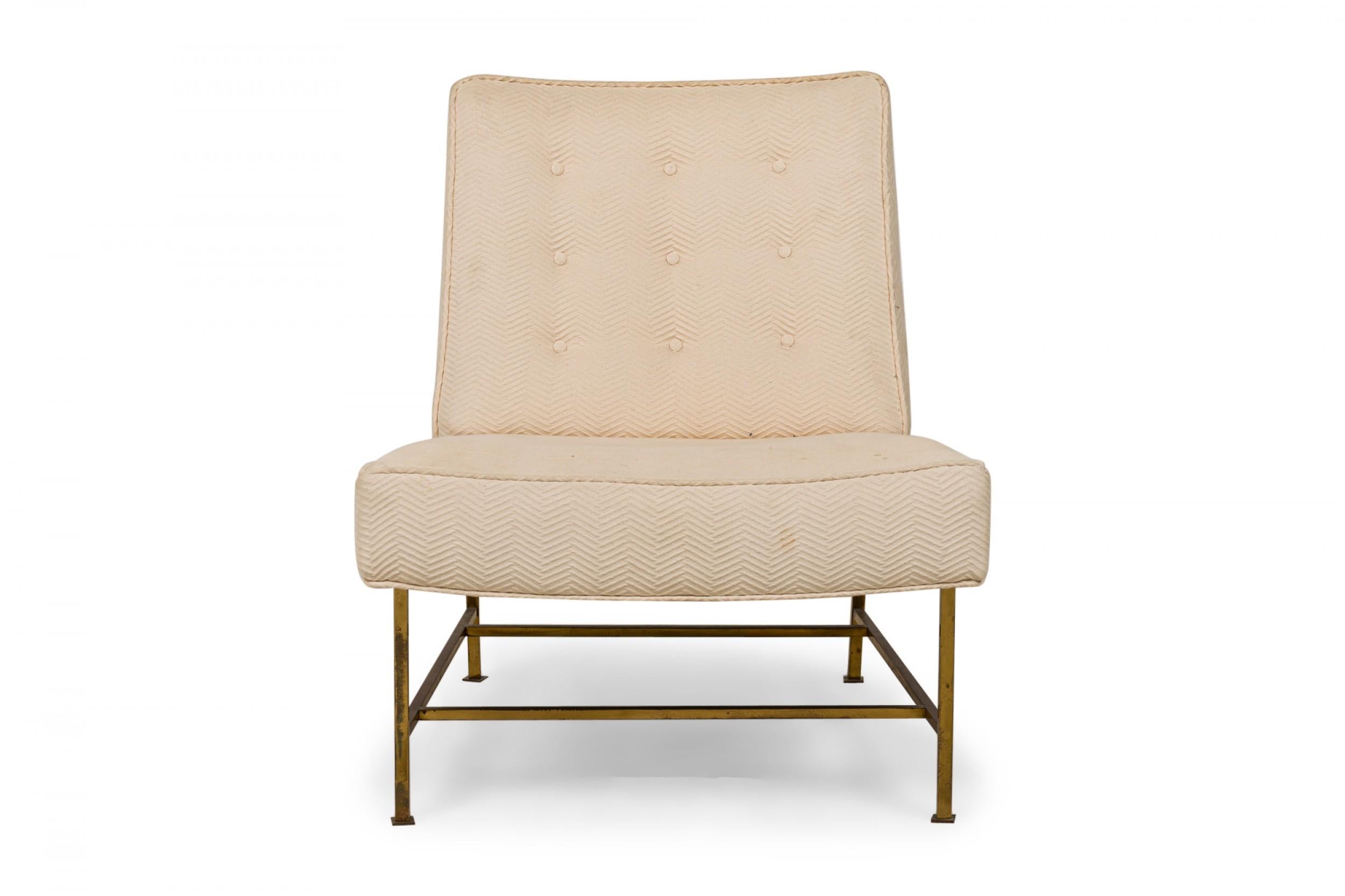 Pair of American mid-century slipper / side chairs with zig-zag textured beige button tufted fabric upholstered seats and backs, resting on a brass square tube stretcher base with legs ending in square feet. (HARVEY PROBBER)(PRICED AS PAIR)
 