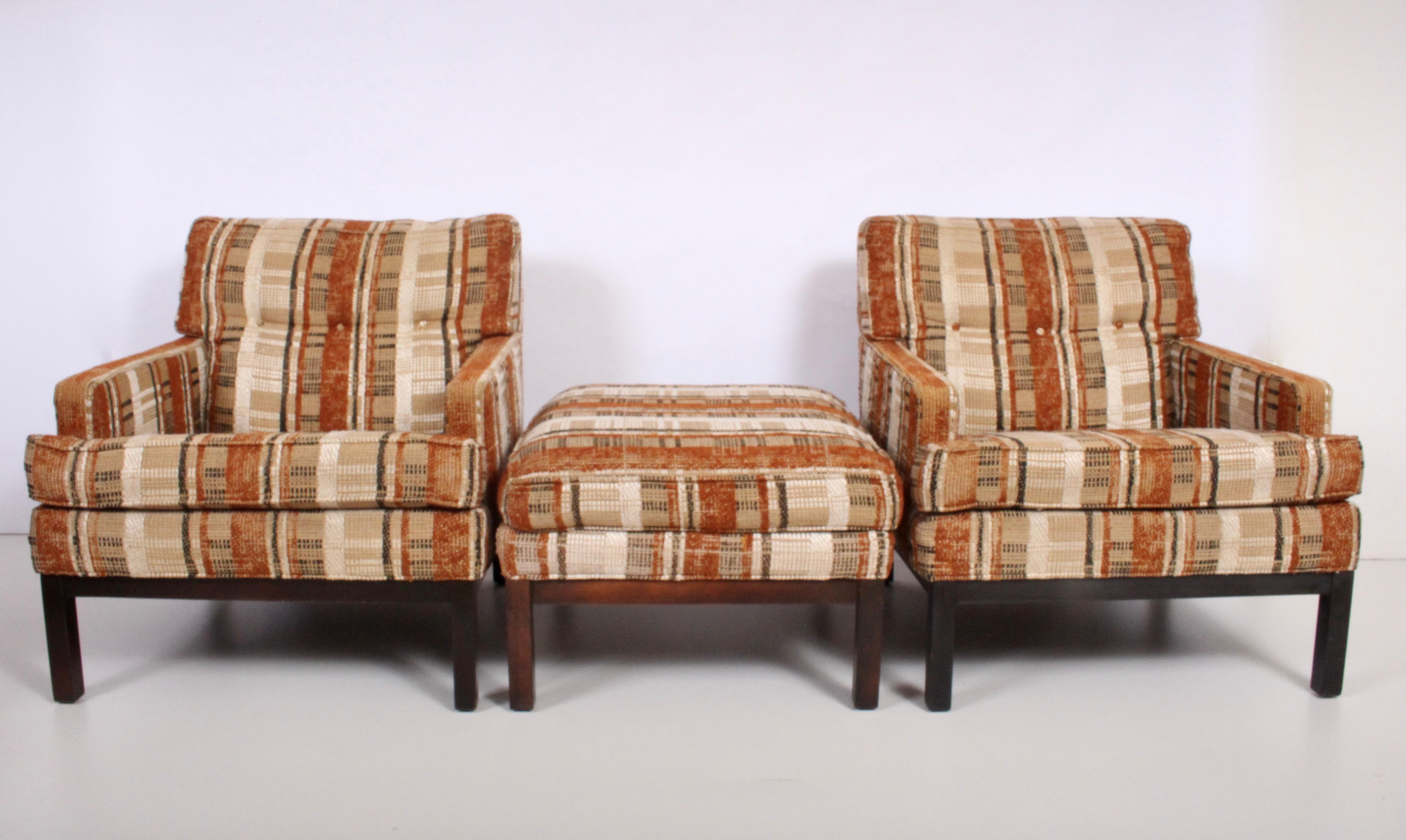 Pair of Harvey Probber lacquered dark walnut for Directional custom collection club chairs with single ottoman. Original blended cotton felt fabric in Earthen tones of rust taupe, chocolate cream and wheat. Ottoman: 29 W x 24 D x 17 H. With