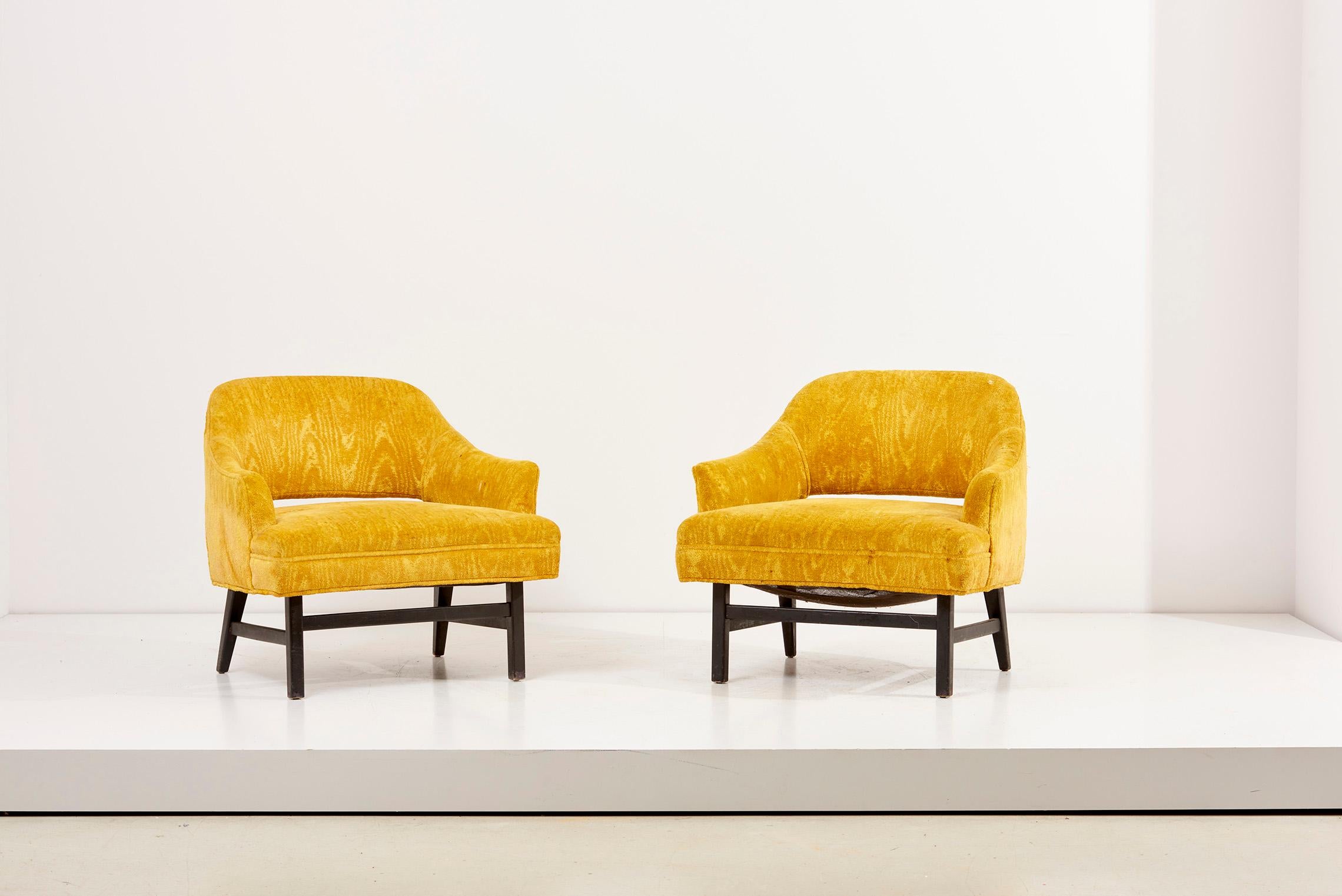 Pair of Harvey Probber lounge chairs in yellow upholstery. 
The chairs have vintage upholstery.