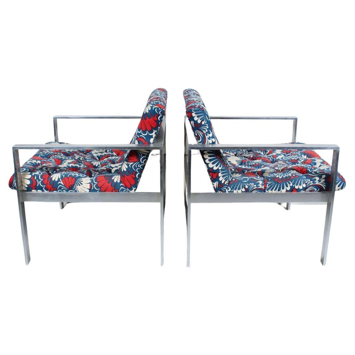 Pair of Harvey Probber 1427A Solid Bar Aluminum Lounge Chairs. Featuring solid Aluminum bar construction, ergonomic slant back, attached spacious cushions, with tufted Blue, Red, White Mod floral cotton fabric - upholstery believed to be original.