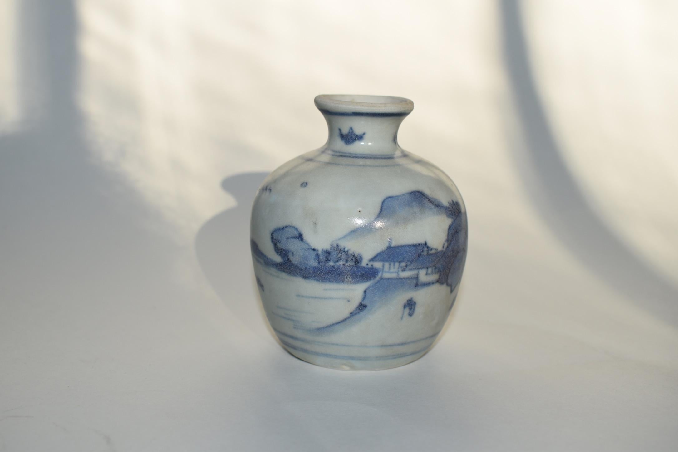 Pair of small 17th century blue and white porcelain jars from the Hatcher collection. 
These jars were part of a hoard recovered by Captain Michael Hatcher from the wreck of a ship that sunk in the South China Sea in 1643. Approximately 25,000