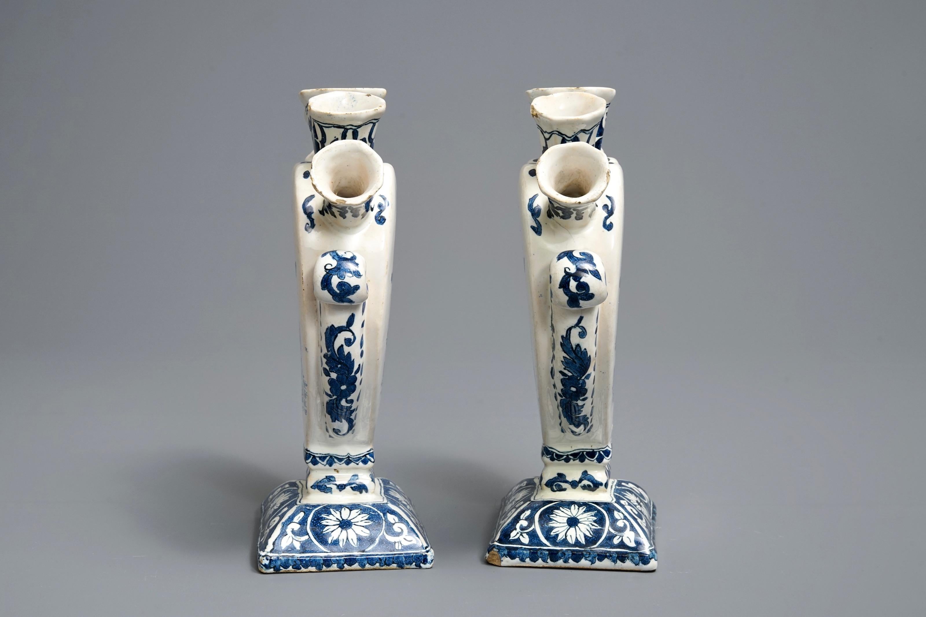 A pair of two Dutch Delft tulip vases or tulipieres
The Netherlands
19th century

A pair of two Dutch Delft, heart-shaped, tulip vases dating from the 19th century. Special about these vases is that they are still a set of two, and not have been