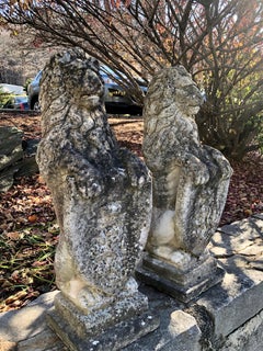 Pair of Heavily-Weathered and Lichened English Cast Stone Armorial Lions