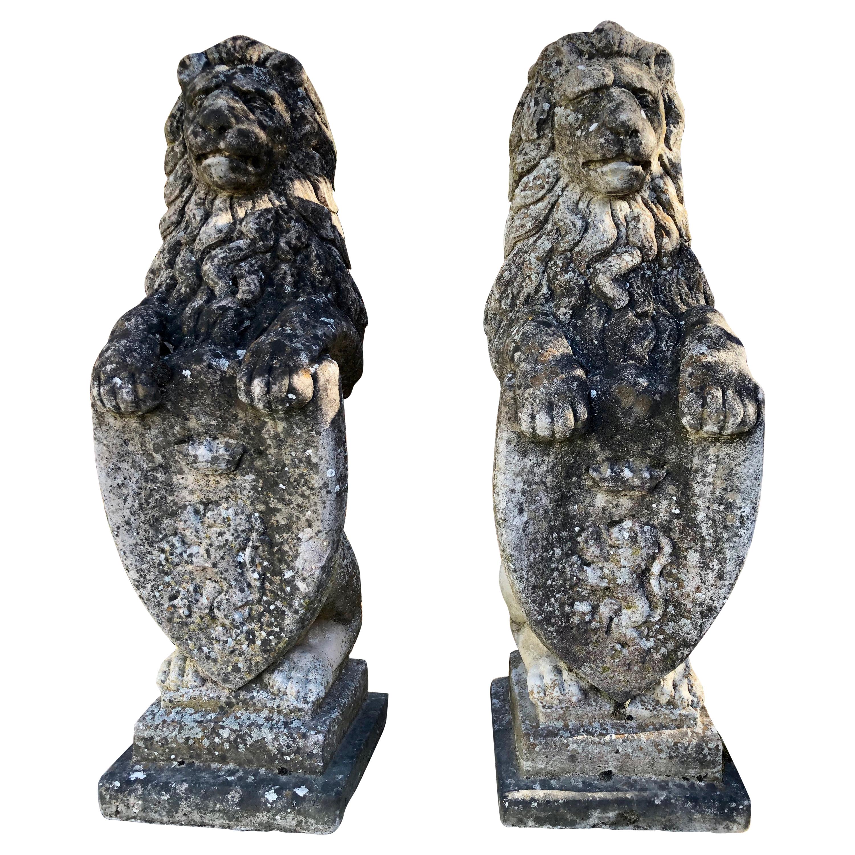 Pair of Heavily-Weathered and Lichened English Cast Stone Armorial Lions