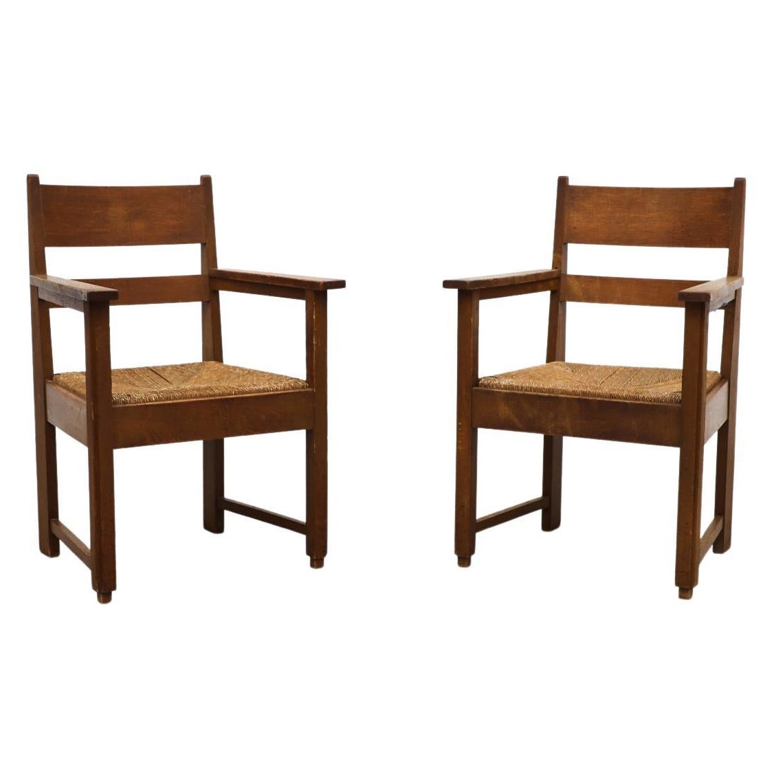Ein Paar schwere und Classic Pierre Chapo inspirierte Oak und Rush Sessel