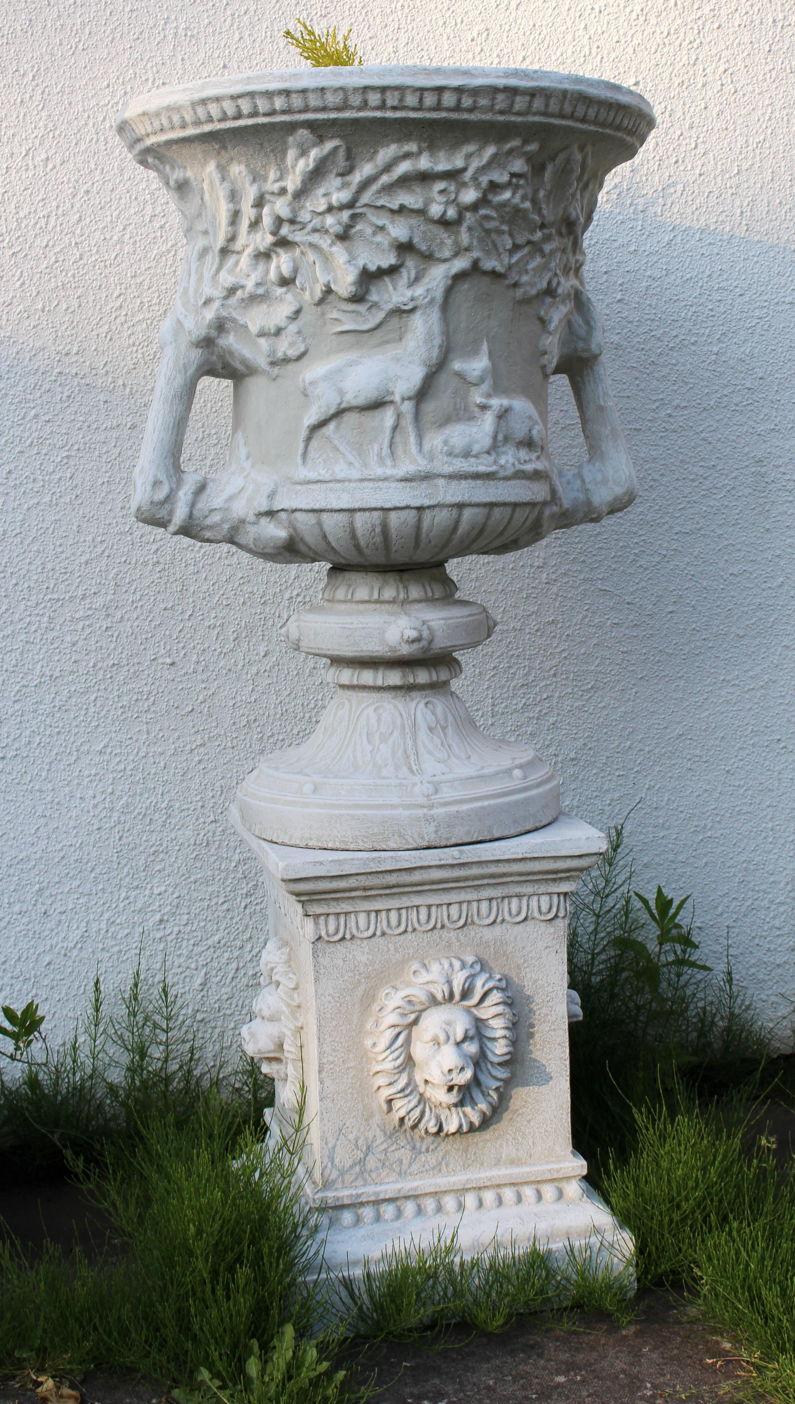Composition 
Stone composite

Finish 
Antique white.

Measures: 
Width 74 cm / 29 in.
Height 142 cm / 56 in.

Very heavy pair of classical style garden urns.

Three sections: Top urn, socle base and pedestal base.

Classical moldings