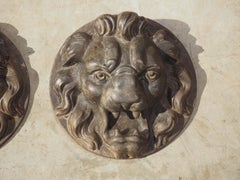 Pair of Heavy French Cast Iron Lion Building Ornaments, Circa 1900
