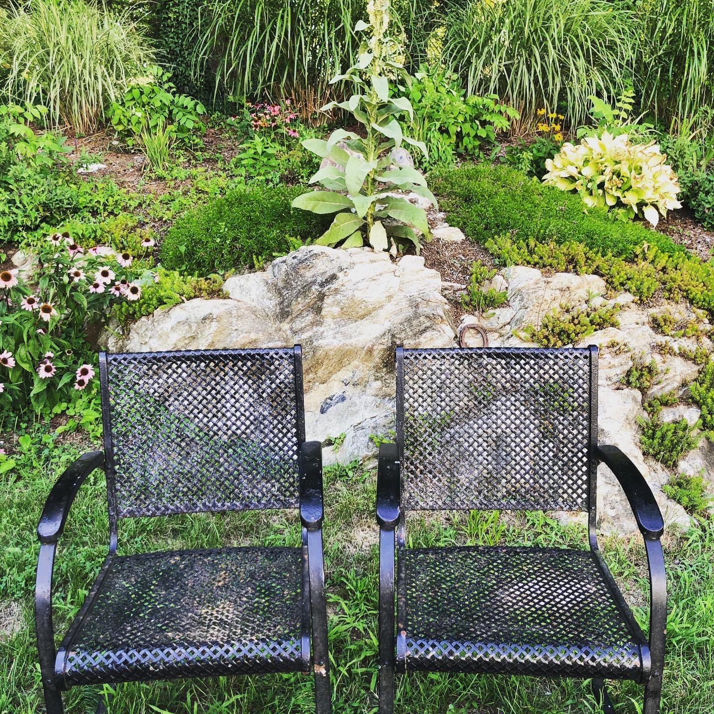 Pair of heavy iron cantilever garden chairs from the 1930s. Most likely produced by Howell Cane. These are the real deal. Heavy, solid construction. These will not blow over in a storm.
Perfect for a garden tableau or vignette.
The W.H. Howell