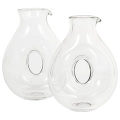 Pair of Heavy Midcentury Loop Glass Pitchers