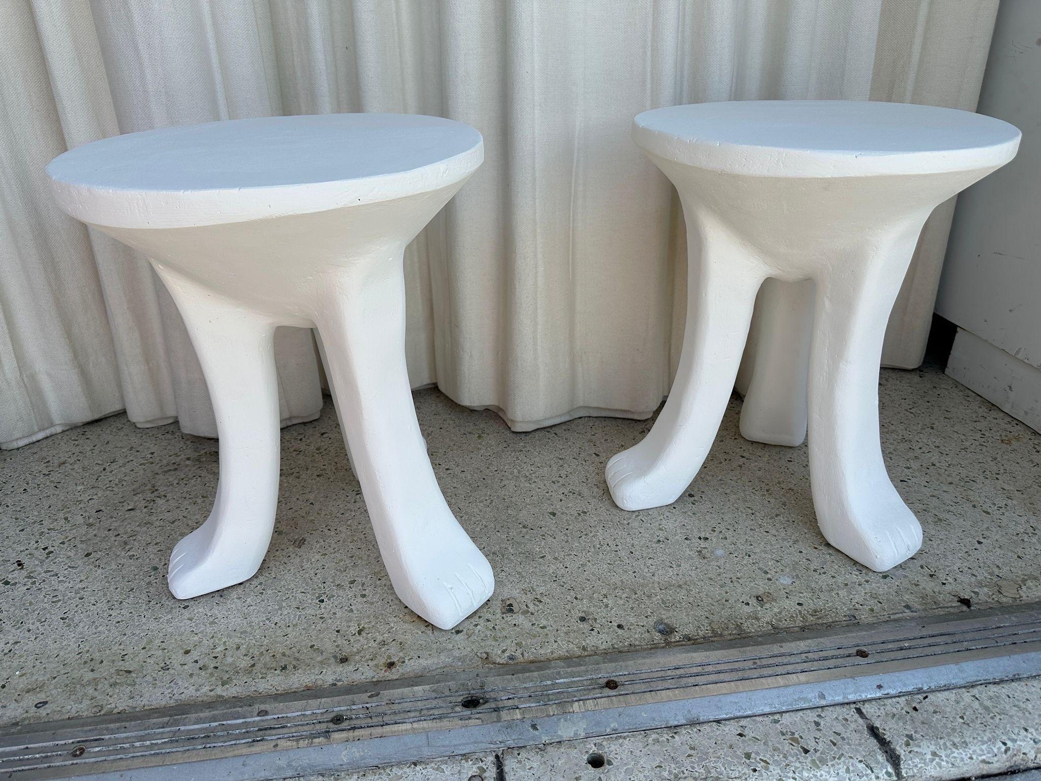 These heavy plaster tri-legged side tables with foot details to legs.  Sourced from a Miami Beach hotel and in wonderful condition (light touch up and repaint).  SEE all detail images and video.  NOTE:  Priced individually, THREE AVAILABLE.