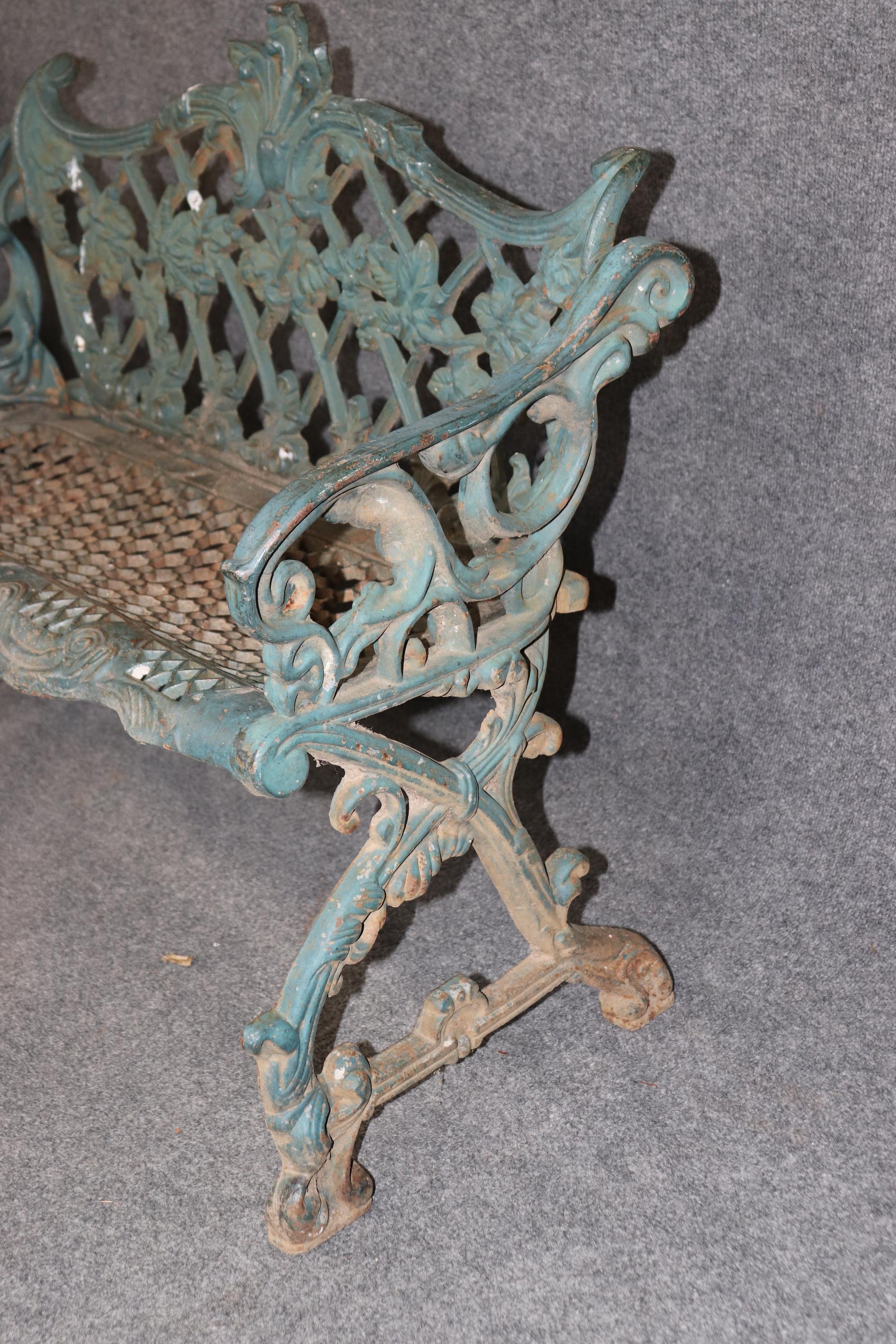 This is a beautiful pair of verdigris finished cast iron benches done in the manner of Fiske in the Charleston style. They are extremely heavy and absolutely charming and will bring a smattering of elegance to your already gorgeous garden or patio.