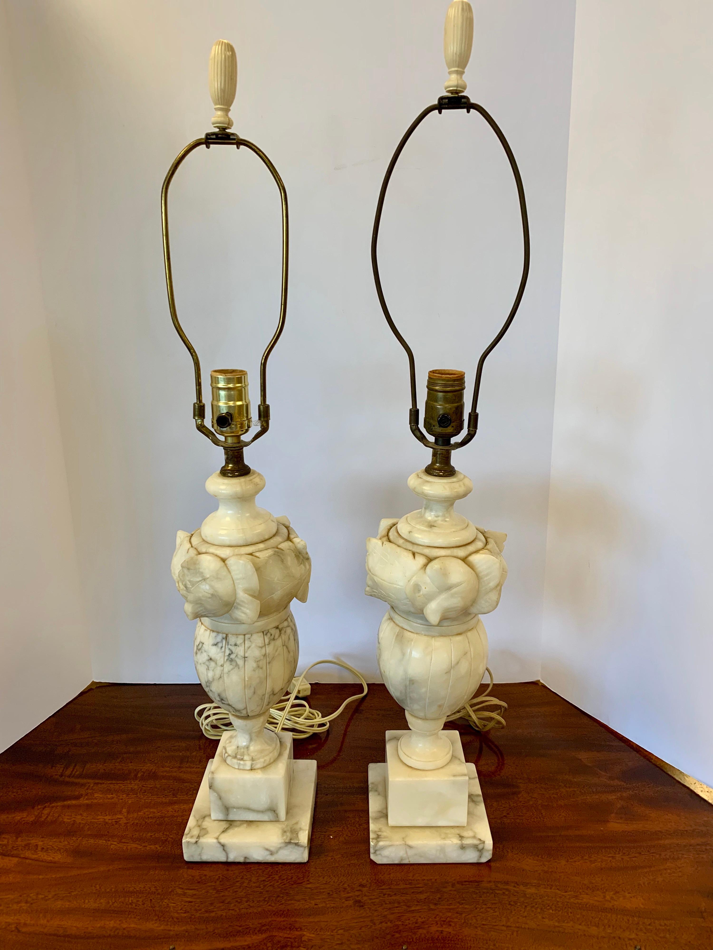 Set of alabaster lamps that have the same scale except one has a harp that is one inch taller, see pics.
Wire for USA in in working order. Made of alabaster with carvings throughout.
       