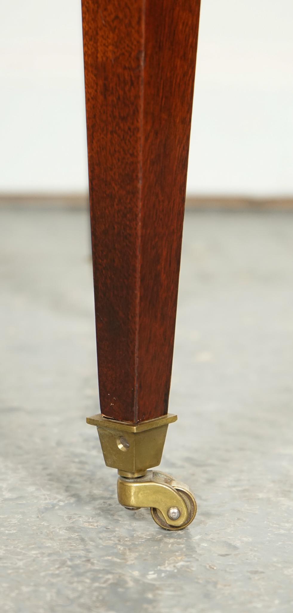 PAIR OF HEIRLOOM WEIMAN HAND DYED LEATHER TOP SiDE TABLES ON CASTORS 3