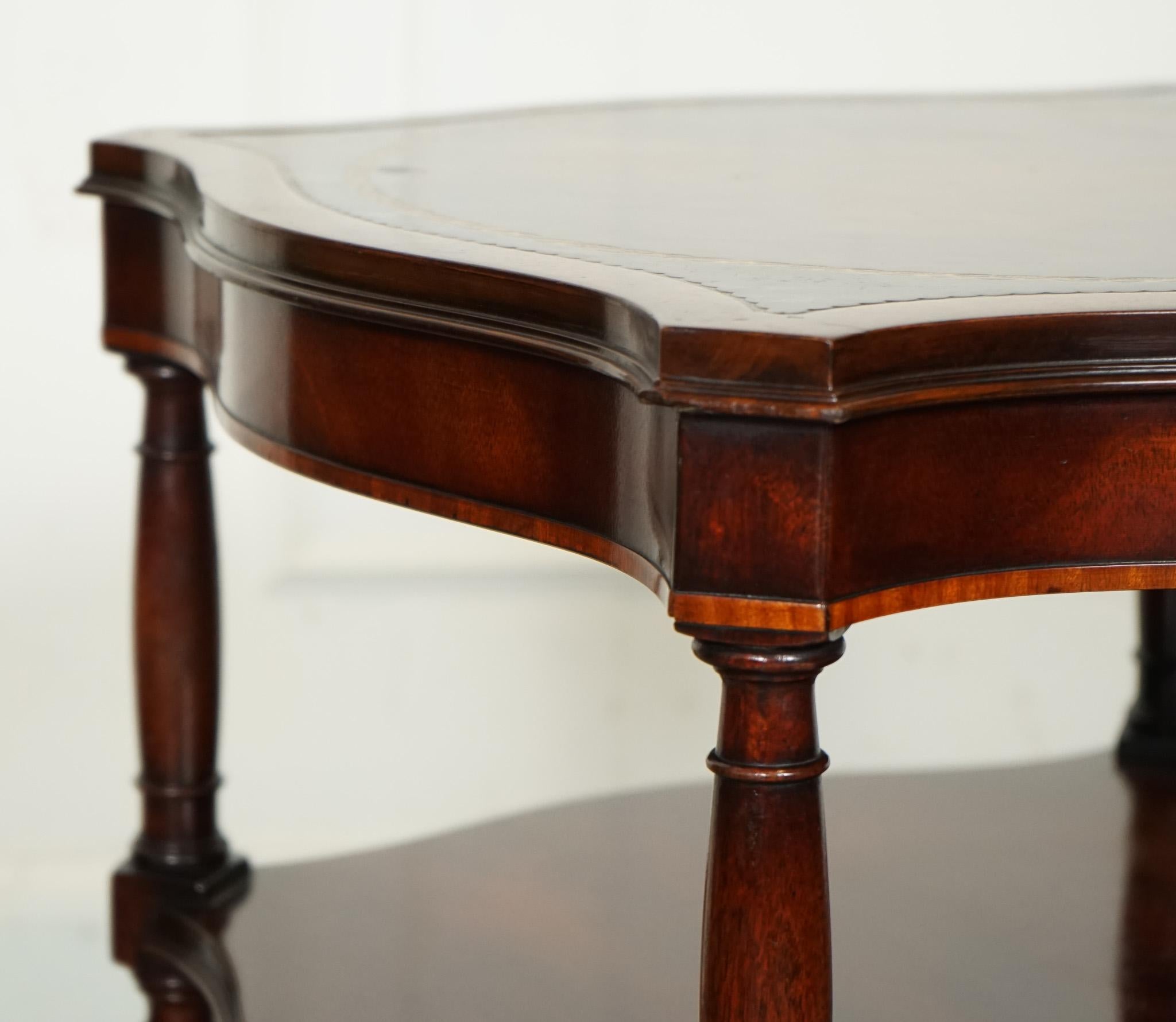 PAIR OF HEIRLOOM WEIMAN HAND DYED LEATHER TOP SiDE TABLES ON CASTORS 1